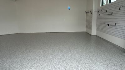 Jon S. transformed his garage with a new floor, slotwall & Cabinets! 