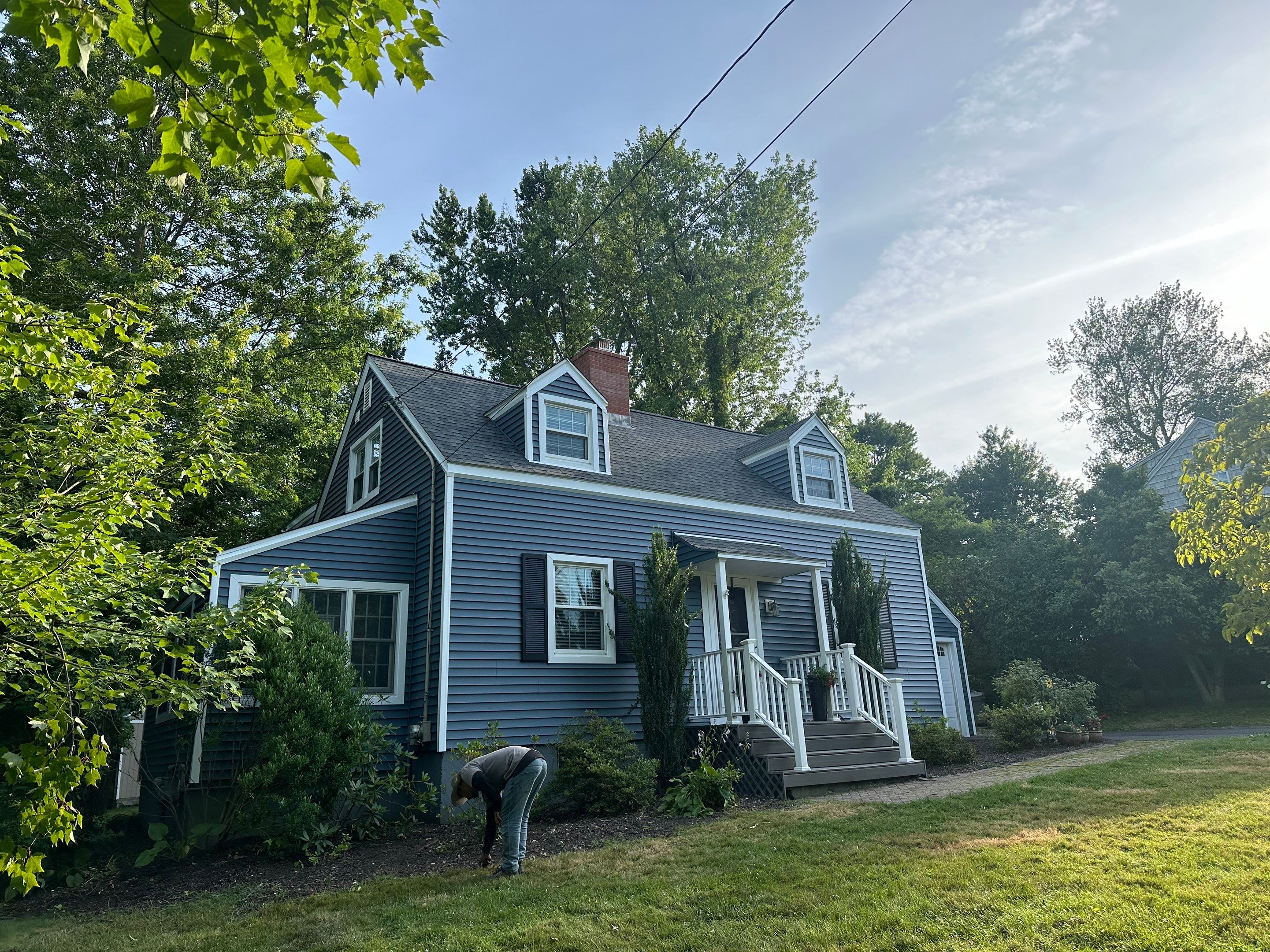 Complete Exterior Estate gray with Pacific Blue Siding by A Plus Exterior