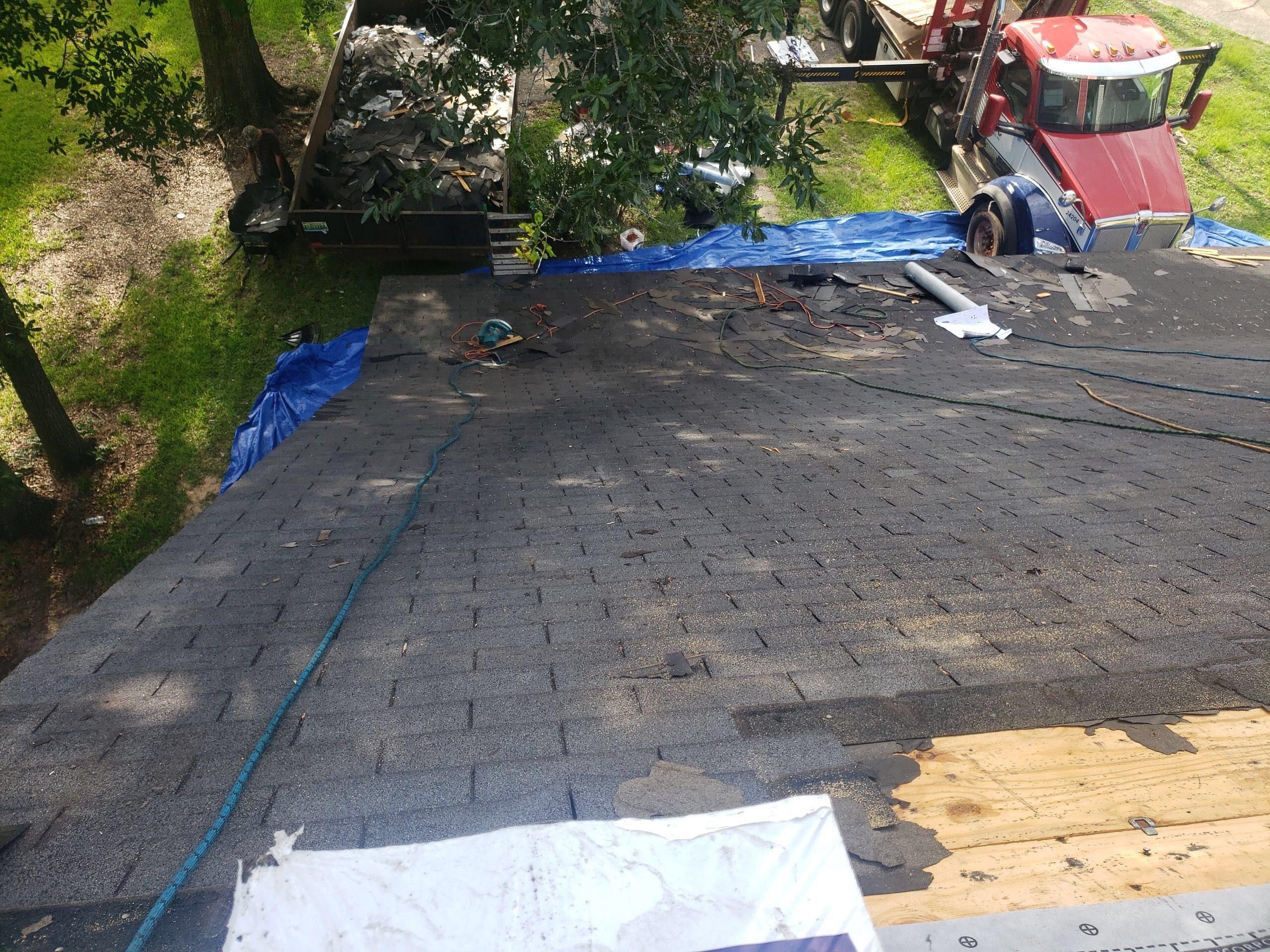 Residential Roofing Installation using Roof Replacement by American Roofing & Construction LLC