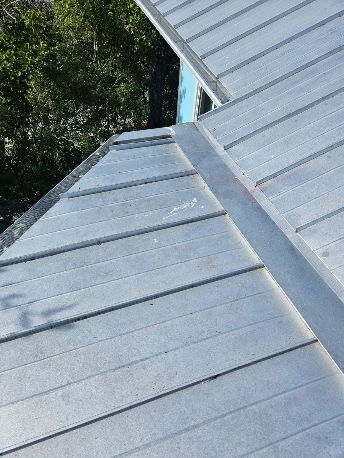 Residential Roofing Repair using Gulf Coast Metals Gulf Seam Panels by Four Peaks Roofing
