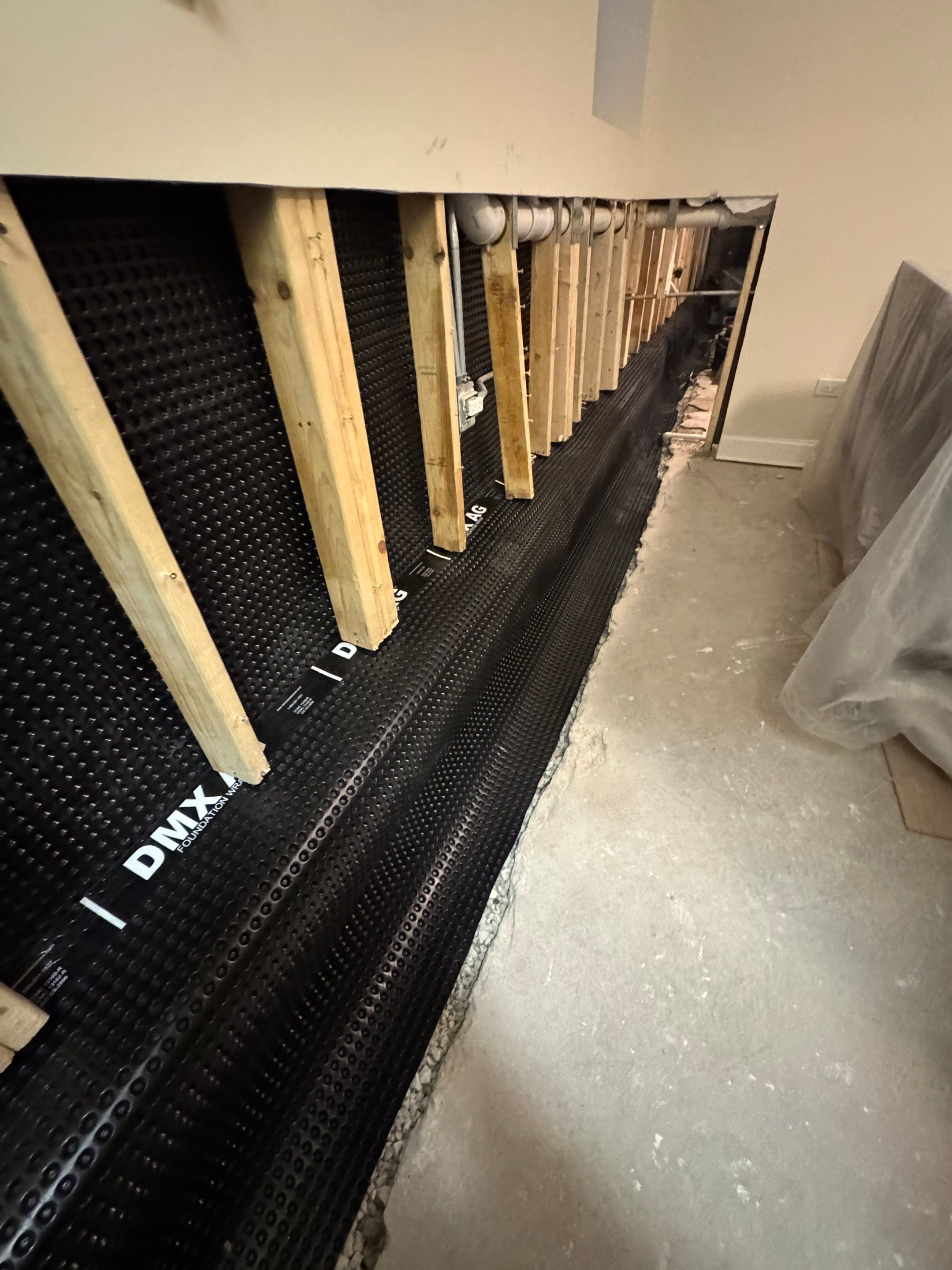 North Side Drain Tile System by Area Wide Waterproofing