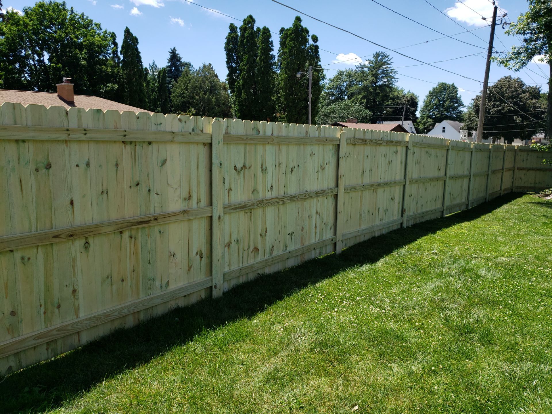 Pressure-Treated Pine Privacy Fence Replacement in Waterloo, Iowa by Perfect Picket Fence and Stain