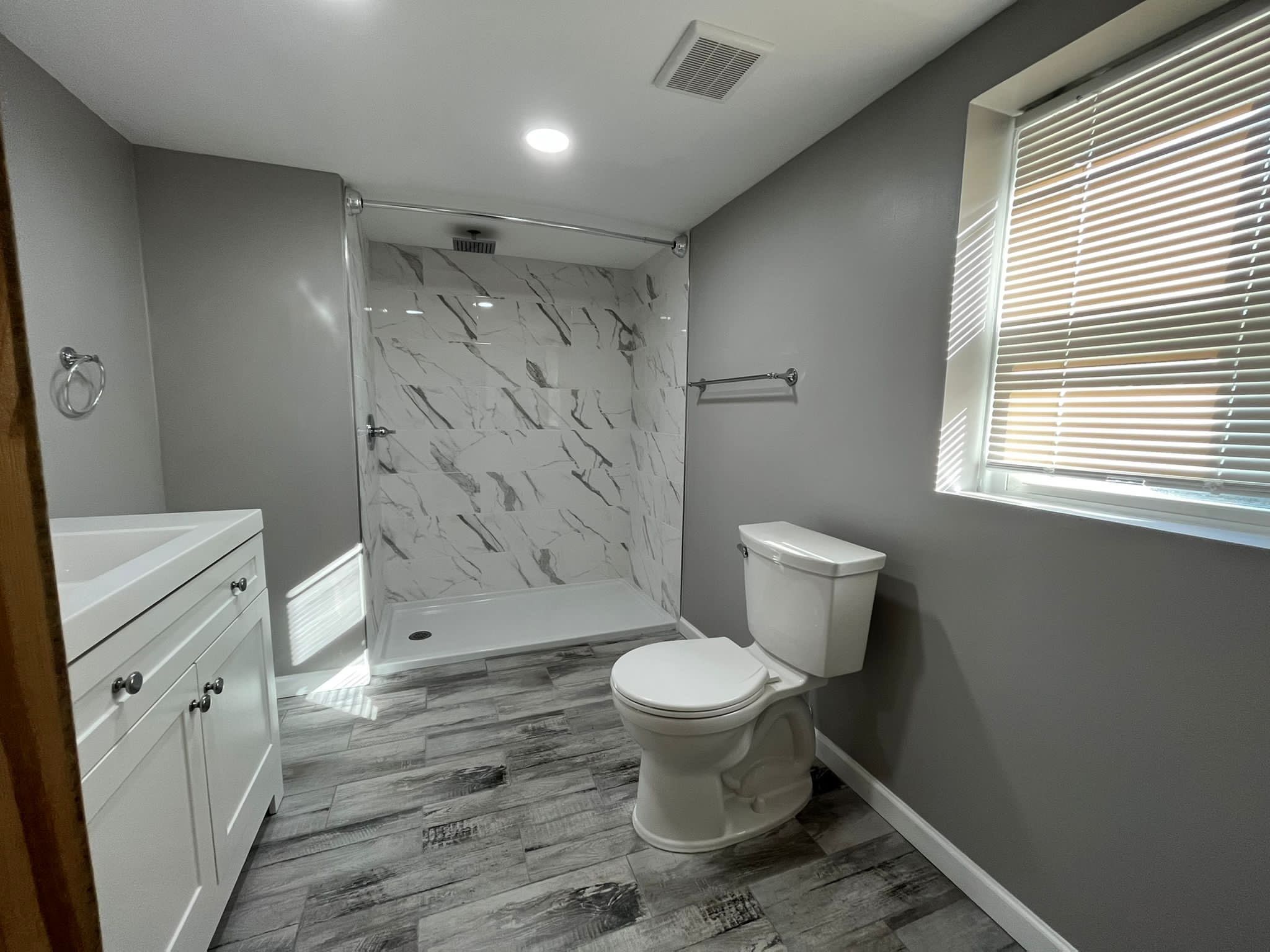 Bathroom Remodel using Tile by Home Concepts Construction