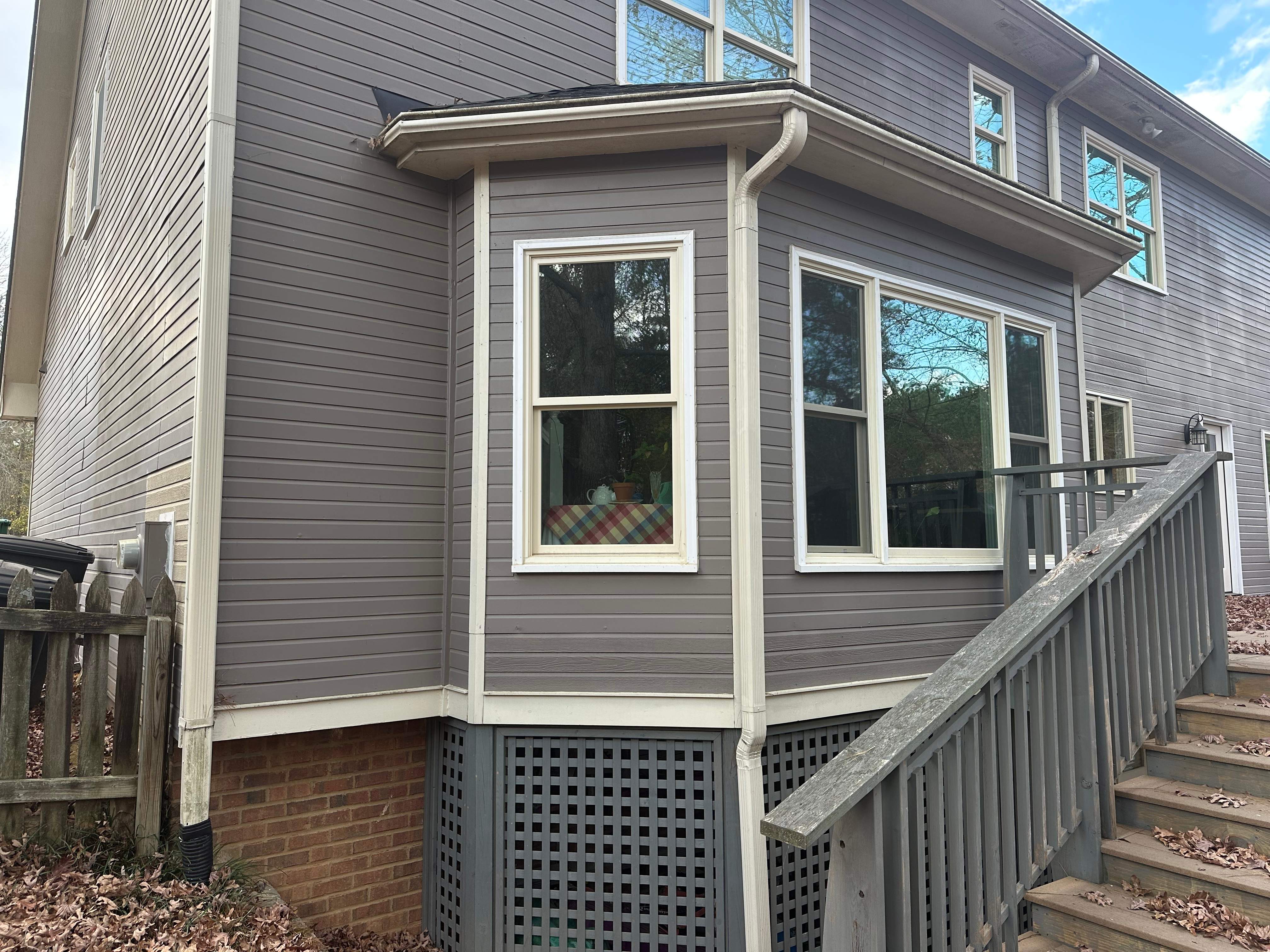 James Hardie Siding Replacement, Exterior Painting, Deck Stain, and Gutter Installation in Peachtree Corners, GA by Nelson Exteriors