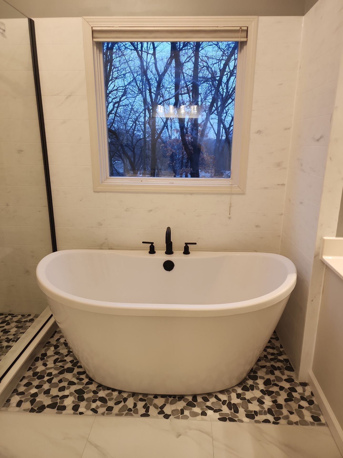 Beautiful use of many materials by The Shower Company