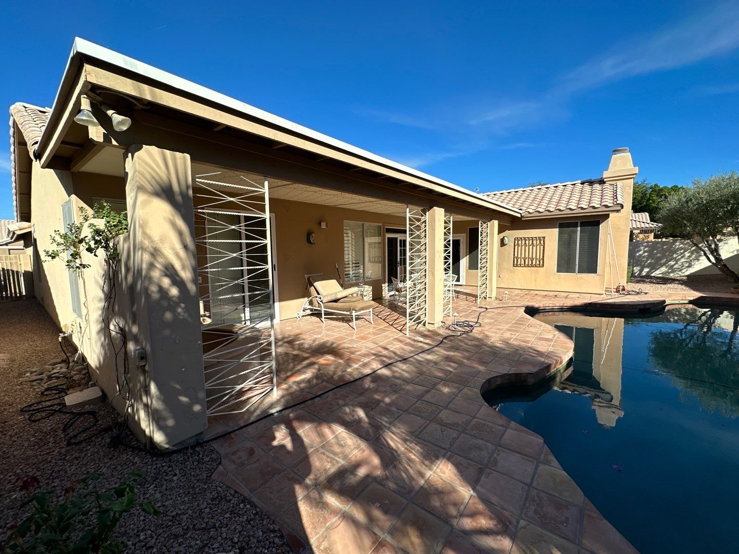 Gazzo - A Beautiful Home Exterior Transformation in Scottsdale, AZ with C&M Primer and Sherwin Williams Paints by Double G Painting Contractors, LLC