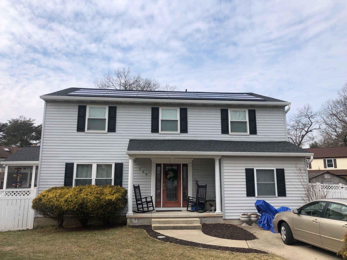 Roof Replacement with GAF Decotech integrated solar panels by American Home Contractors
