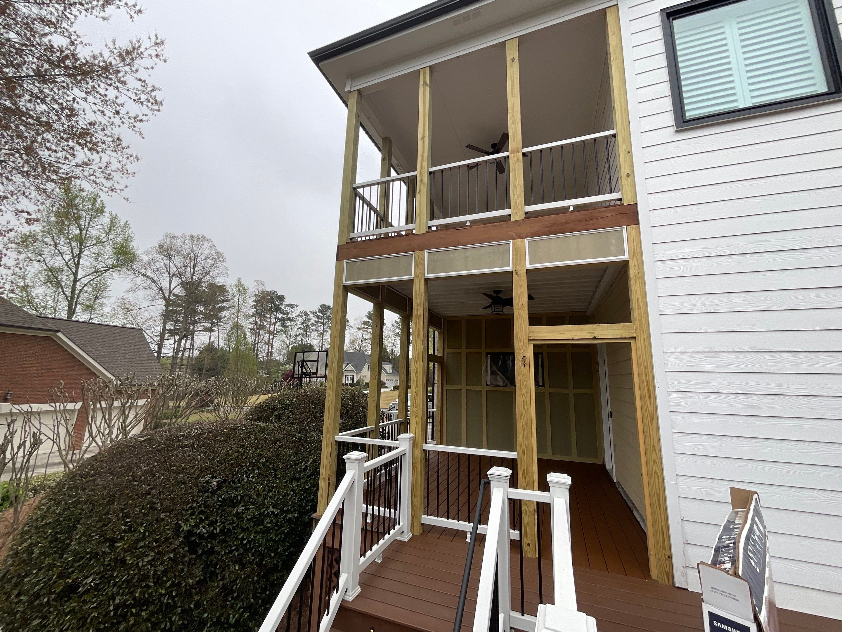 Two-Level Custom Screened Porch and Composite Deck in Alpharetta by Swift Home Renovations