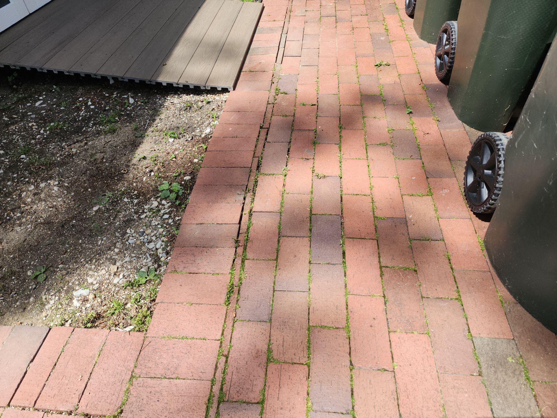 Brick paver repair, cleaning and sealing by Northern Power Washing LLC.