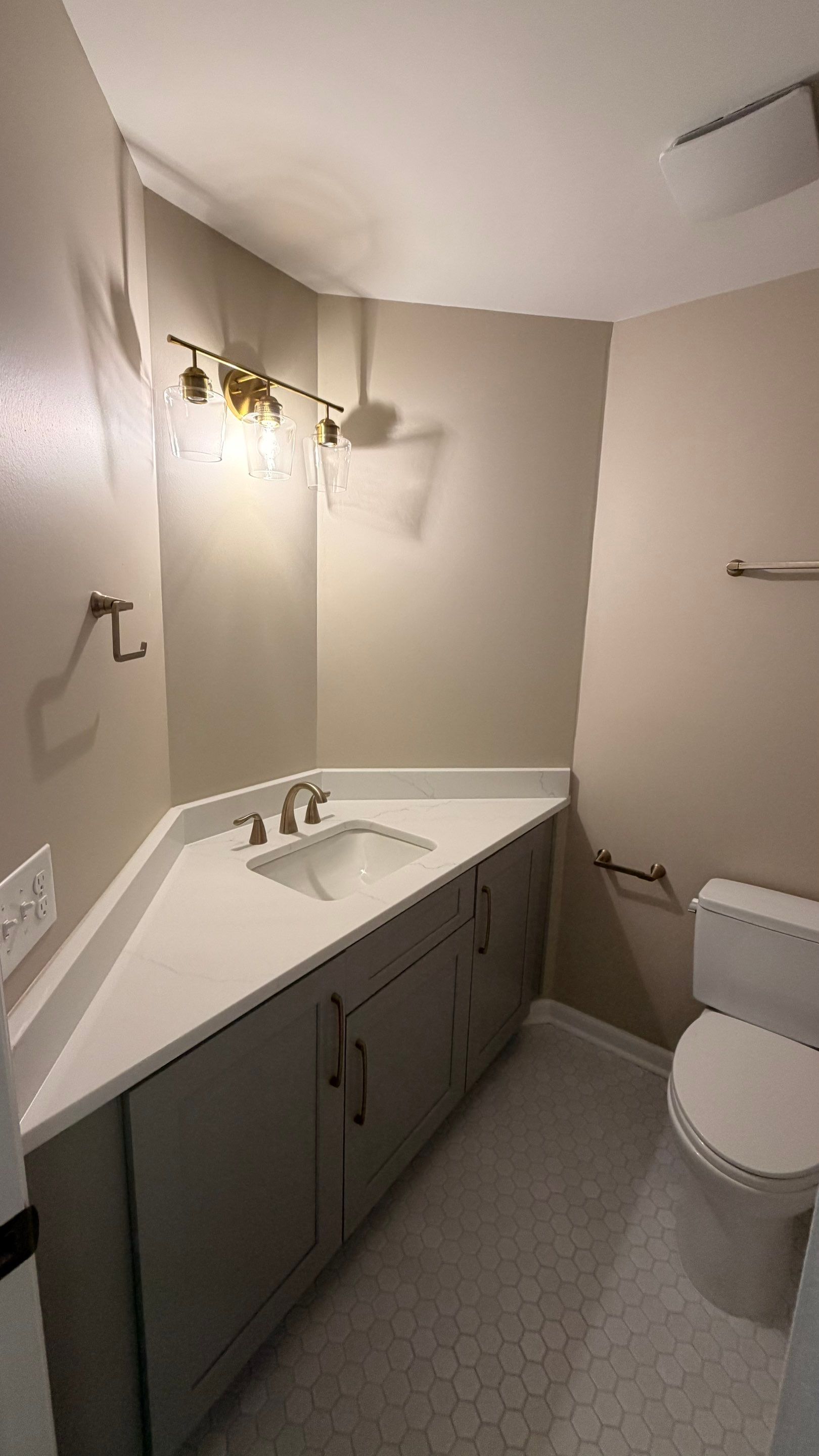 Modern Bathroom Remodel With Quartz Countertops and Hexagonal Tile in Acworth by Swift Home Renovations
