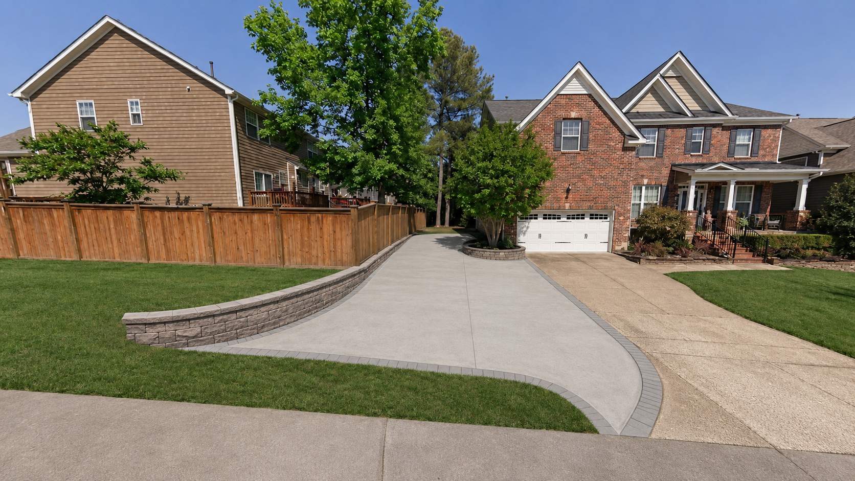 Concrete Driveway Expansion & Retaining Wall | Apex, NC by Elite Remodeling and Design LLC