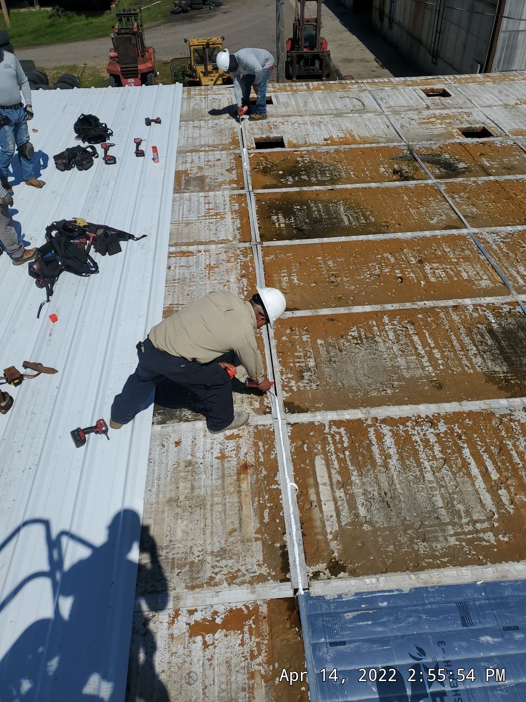 Commercial Roofing Installation using Aluminum Roofing panels by Hostetler Roofing
