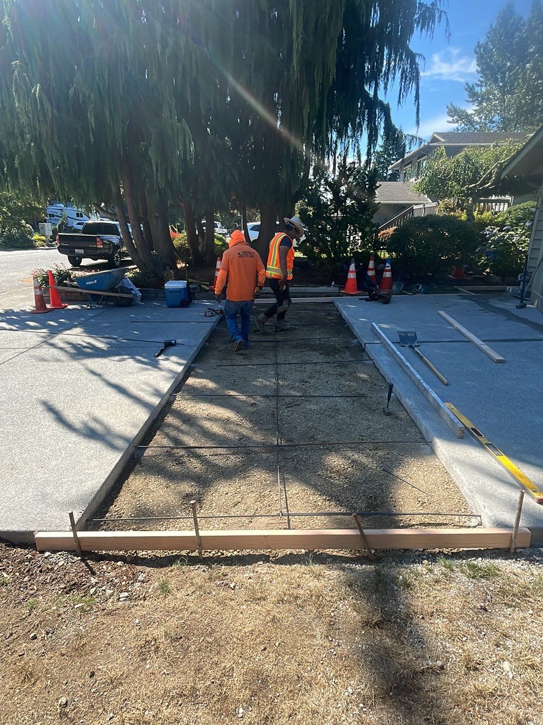 Joan | Concrete Driveway & Walkway   by Jireh Asphalt & Concrete Inc 