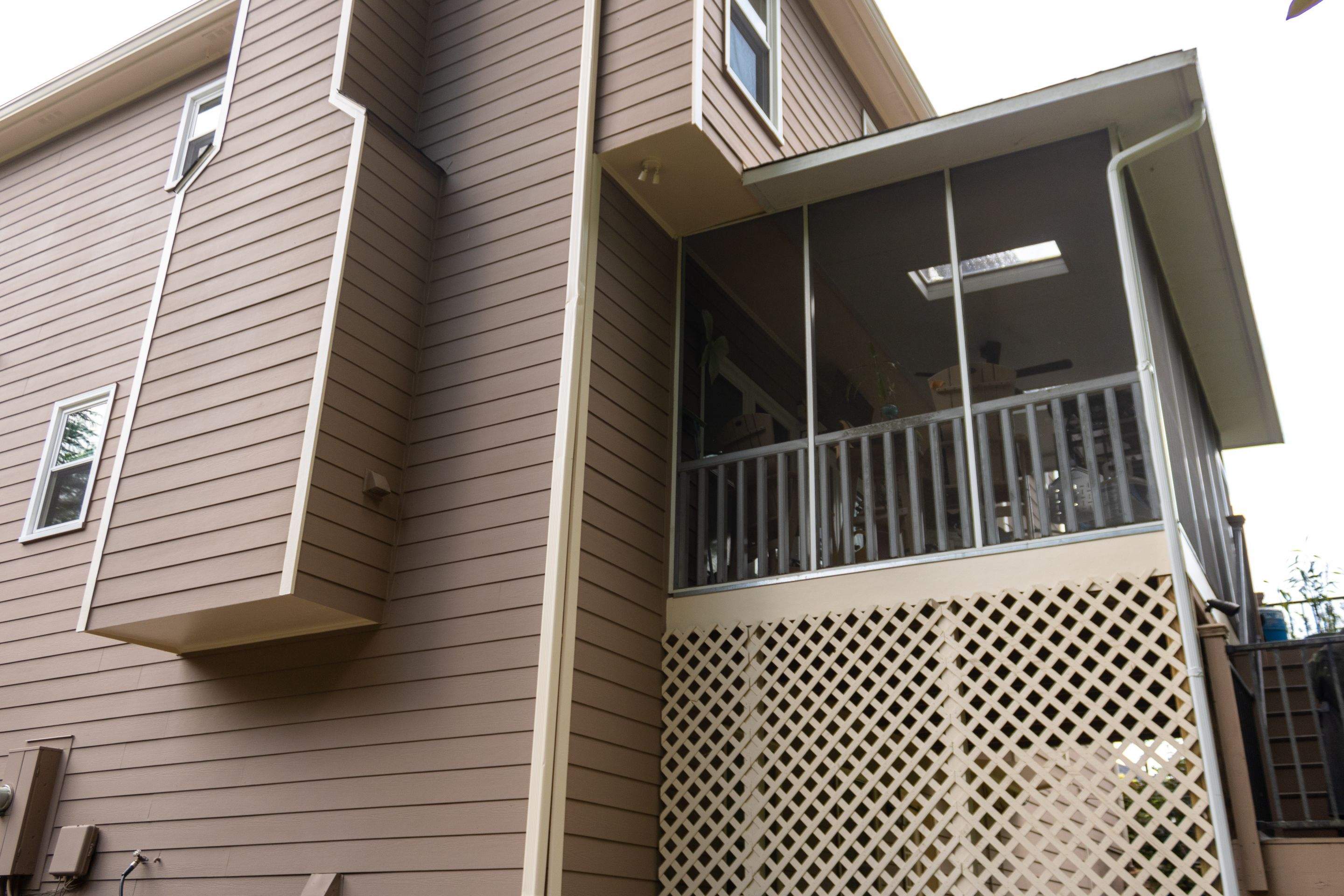 Exterior Painting using Sherwin-Williams and Rotted Wood Replacement by Nelson Exteriors 