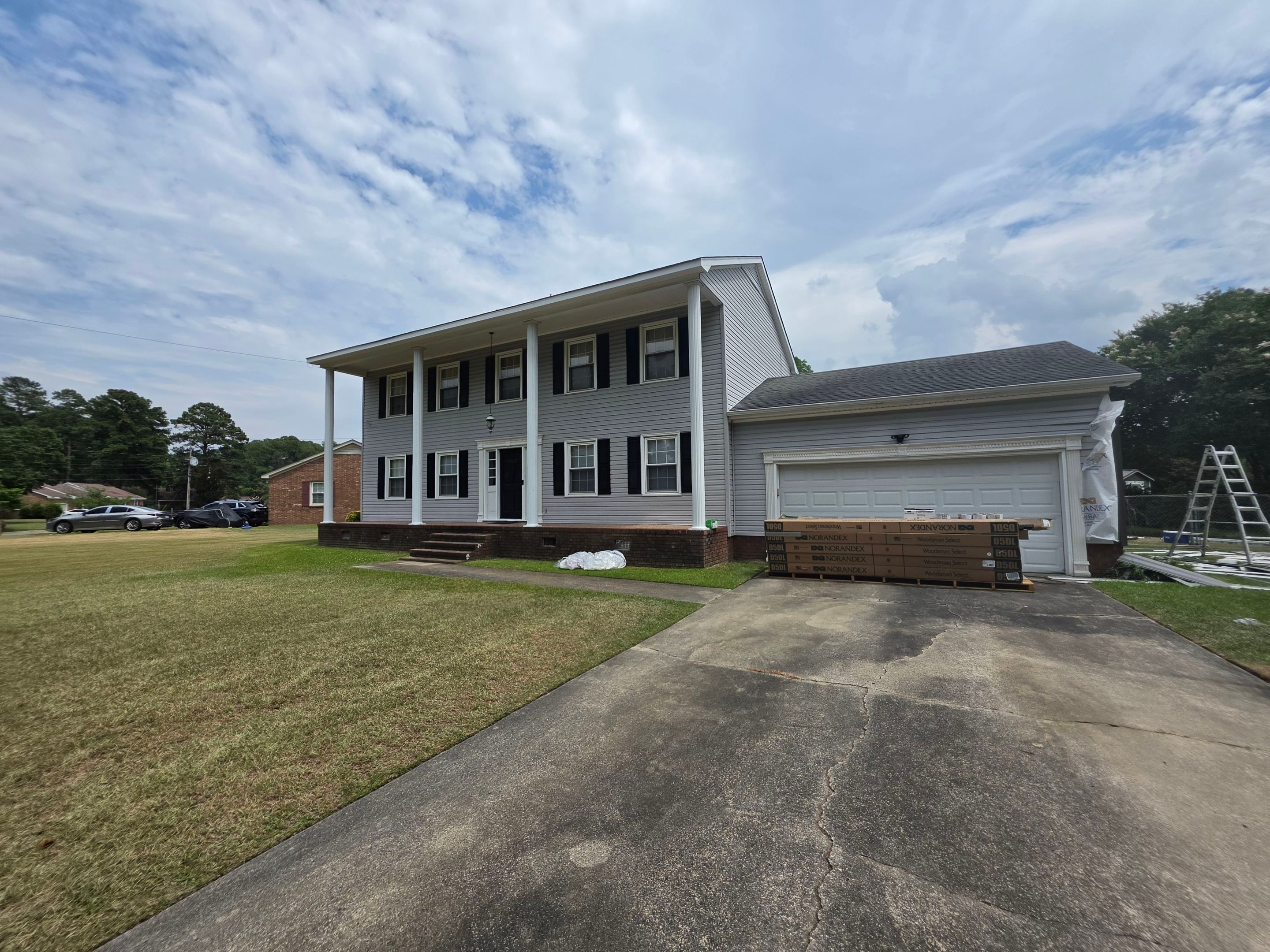 Dark Gray Siding and Custom Deck Installation in Kinston by The Remodeling Company