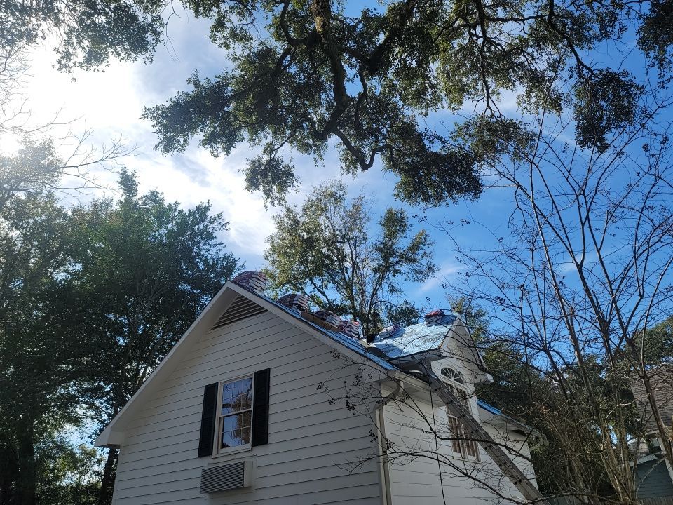 Residential Roofing Installation using Roof Replacement by American Roofing & Construction LLC