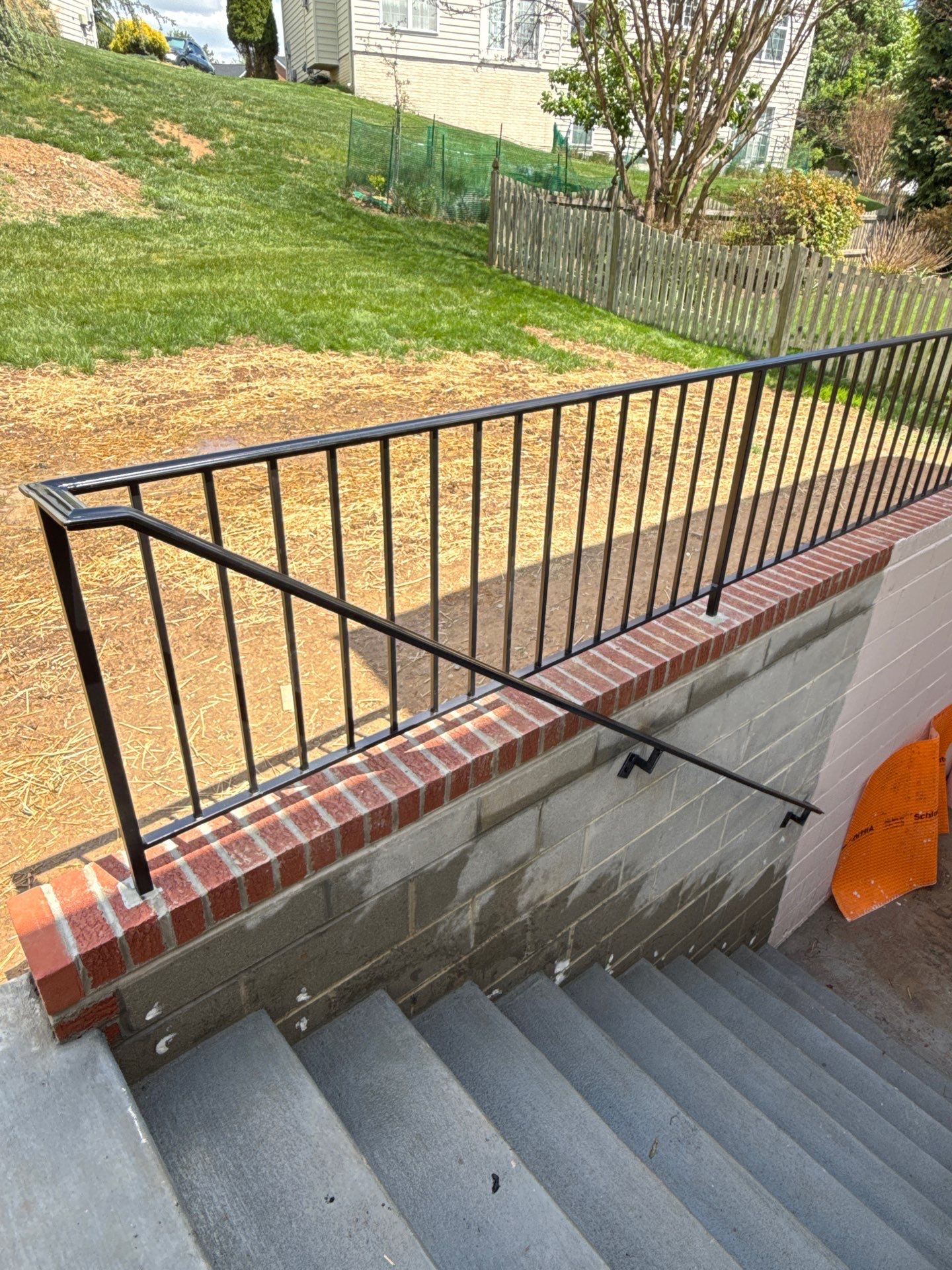 Basement Stairwell and Window Well Railing Installation in Germantown by Capitol Iron Works