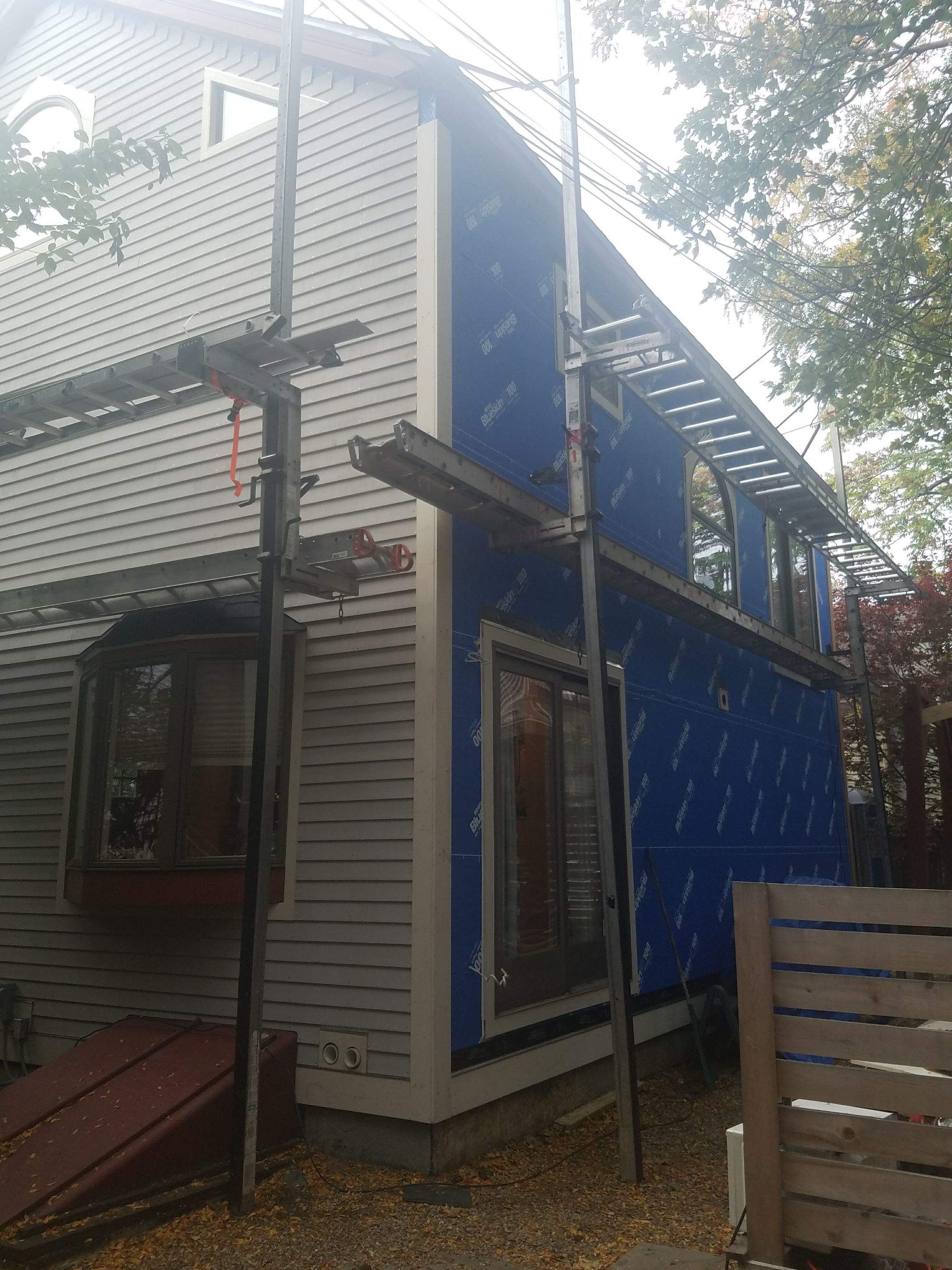 Siding Installation using Cedar Clapboard by Loyalty Exterior Solutions 