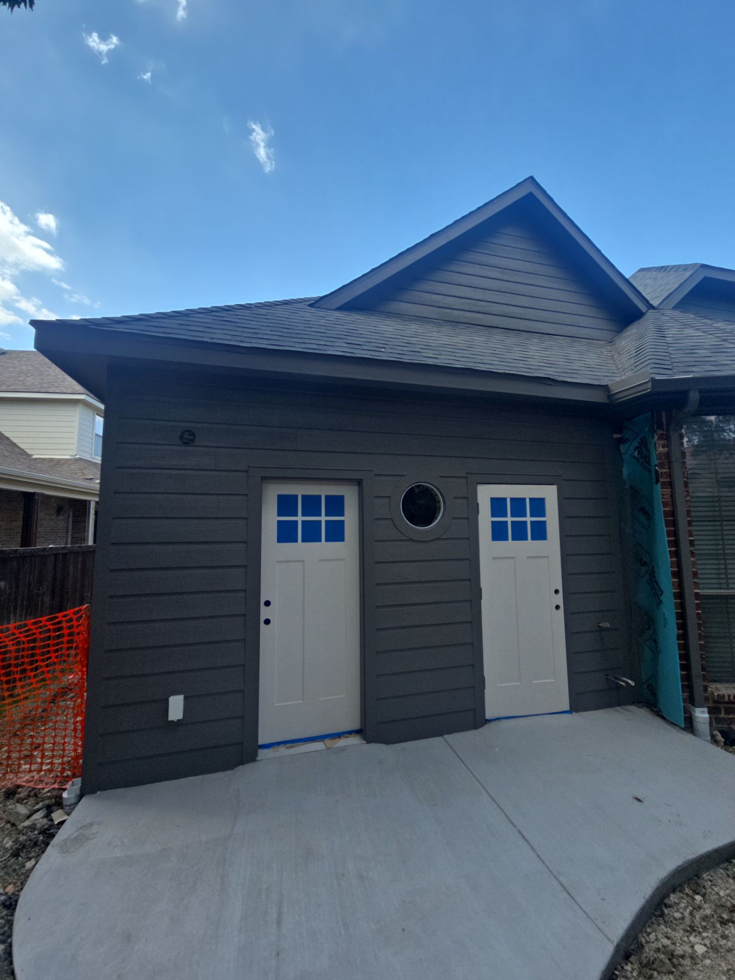 Garage and Pool Bath Addition by SLM General Contractors & Roofing