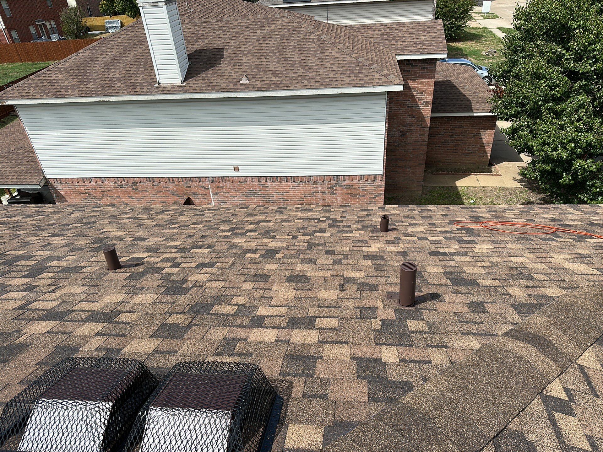Full Roof Replacement, Chimney Rebuild and Interior Damage Replacement by First United Roofing & Construction