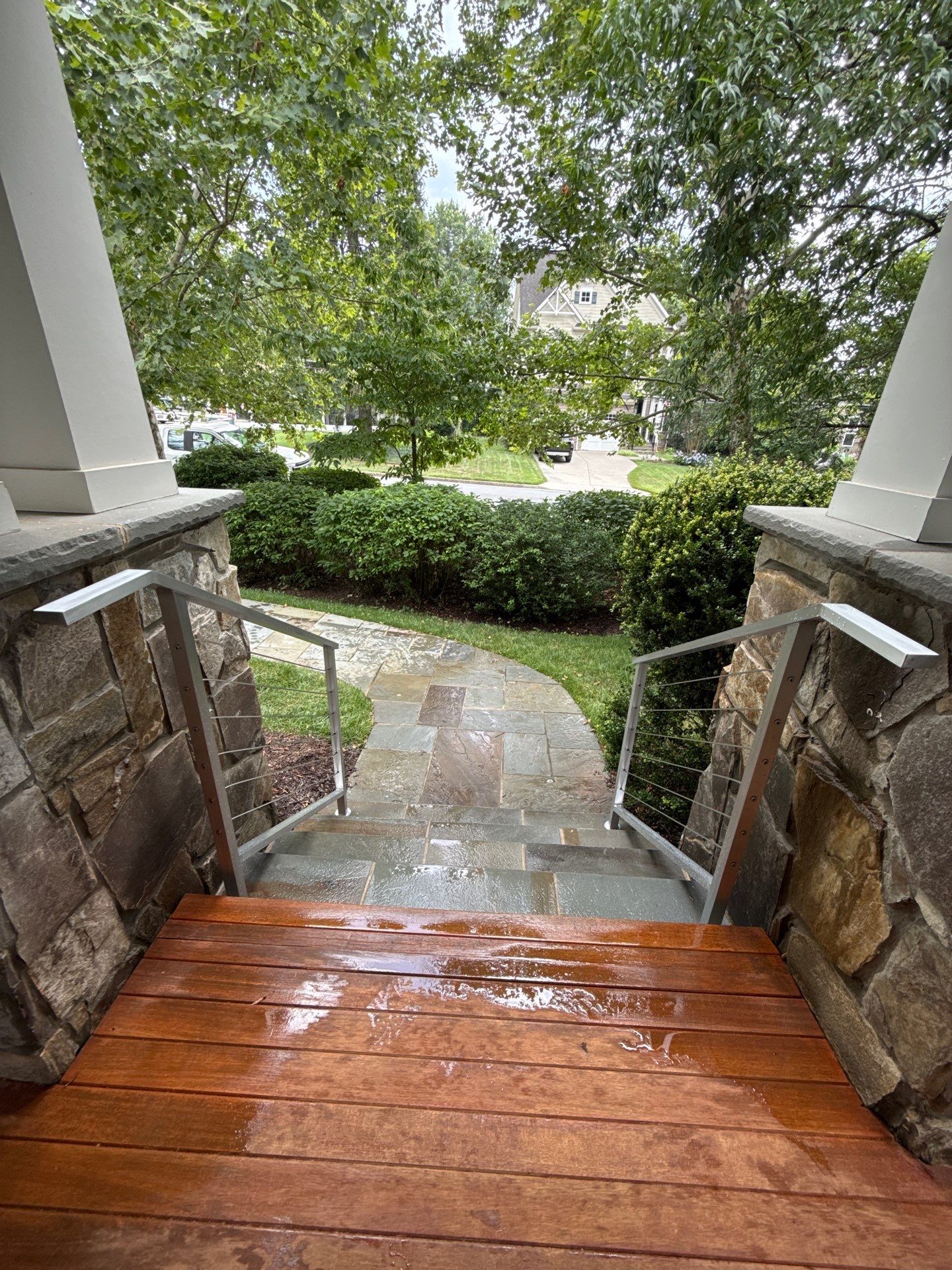 Custom Stone Porch Steps with Modern Cable Railing in Falls Church by Capitol Iron Works