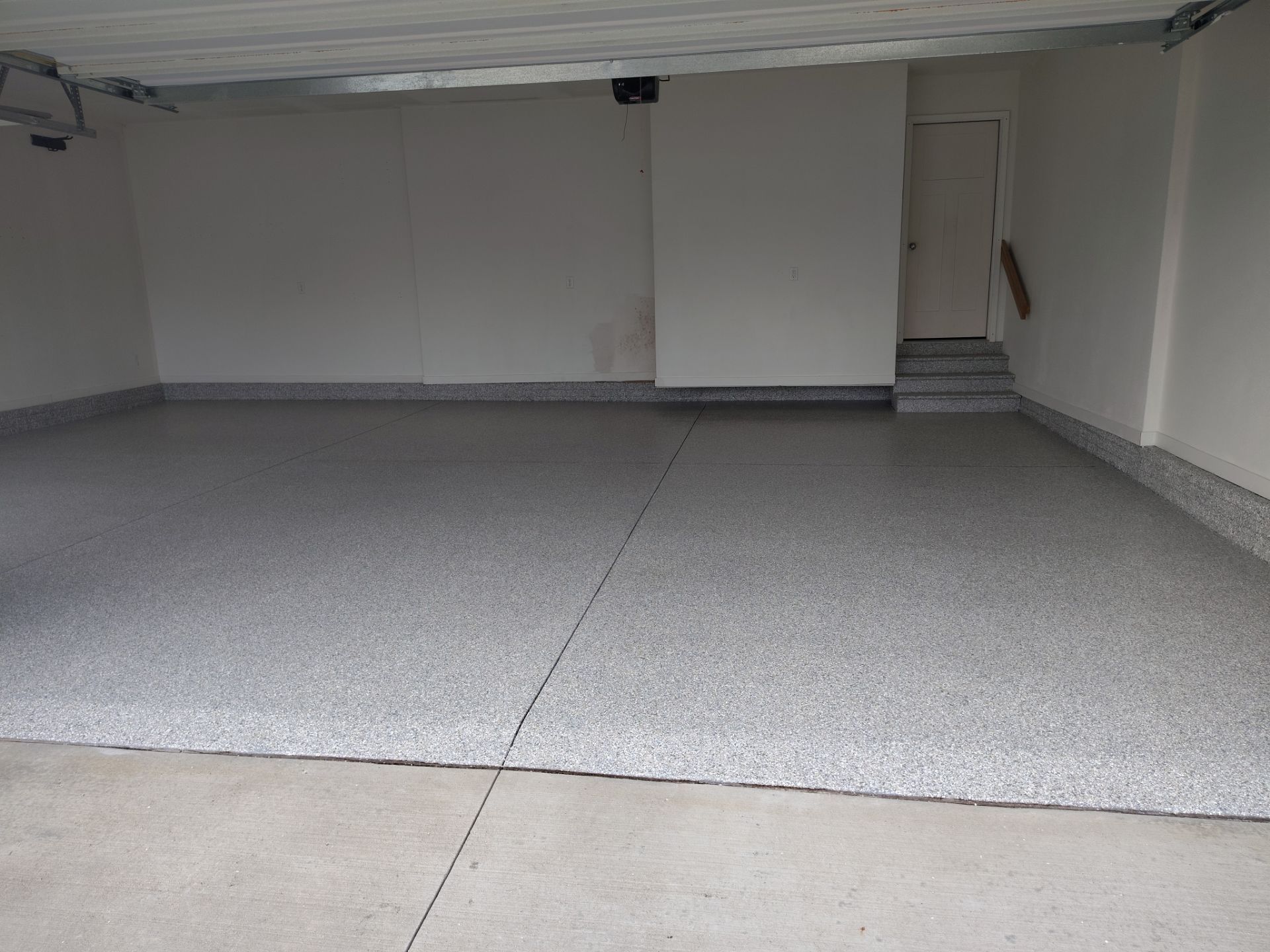 Polyaspartic Garage Floor Coating in Waukee, Iowa by Revival Concrete Coatings
