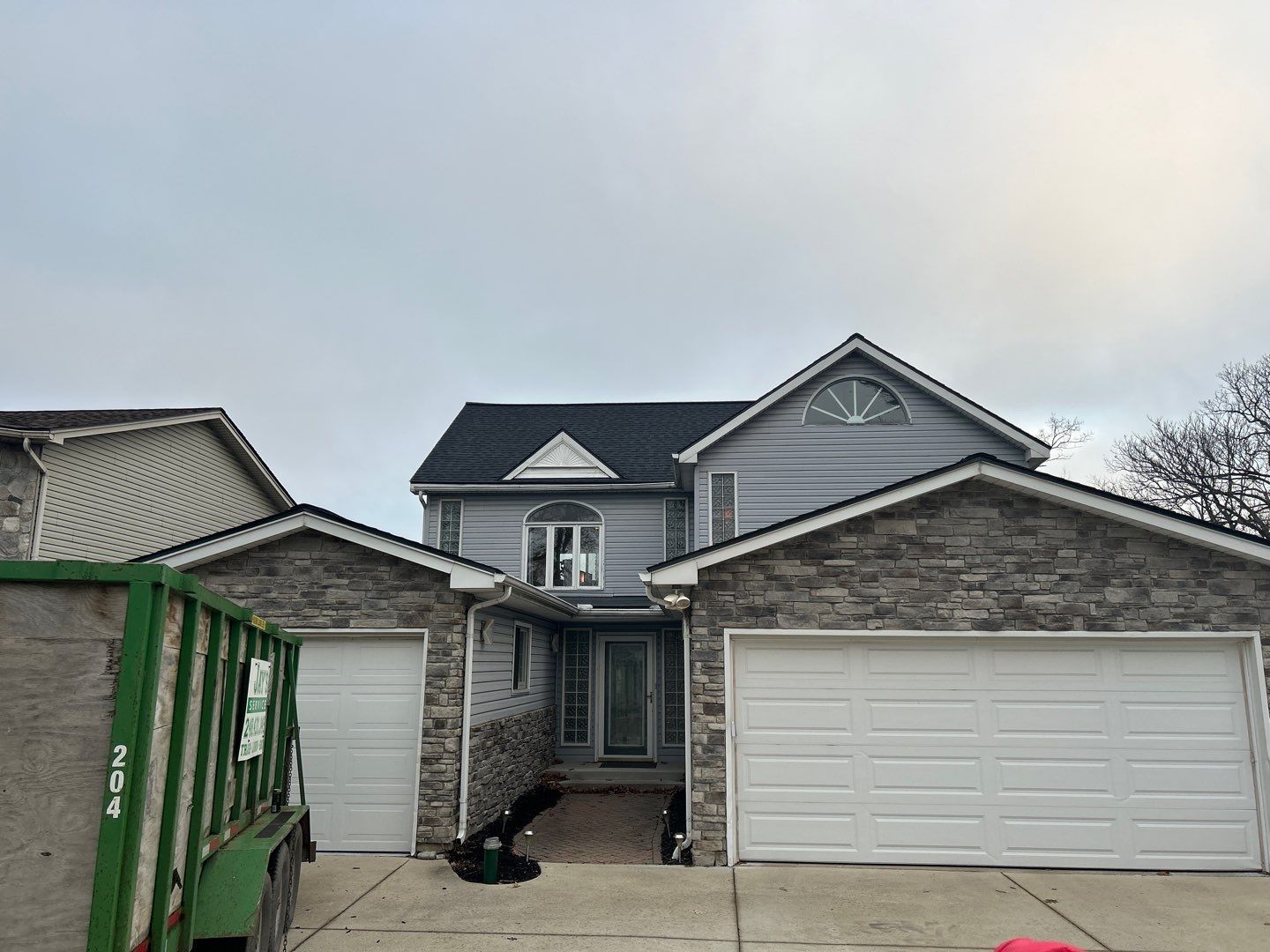 Roof Replacement using CertainTeed Landmark Moire Black by 180 Contractors