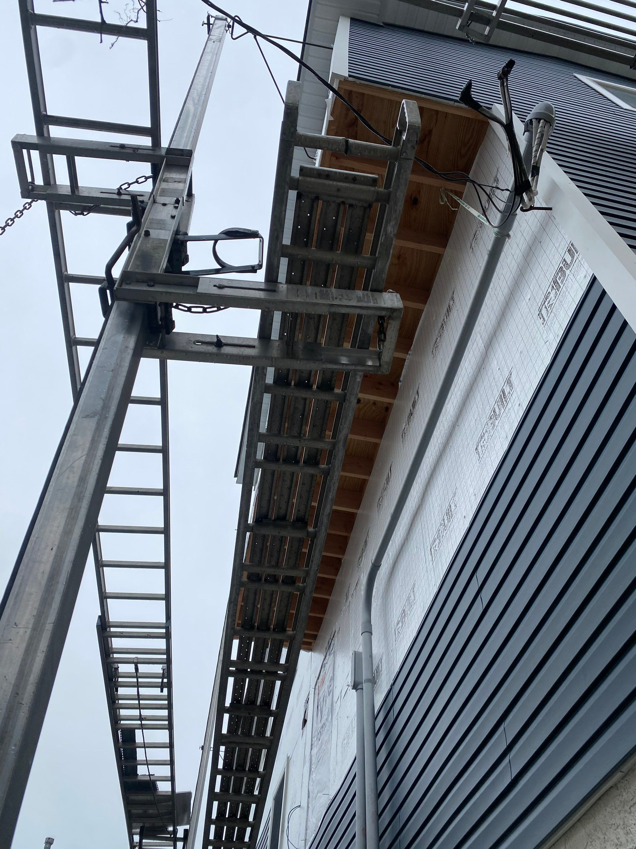 House lift in the westend of Long Beach.  by Above All Gutters 