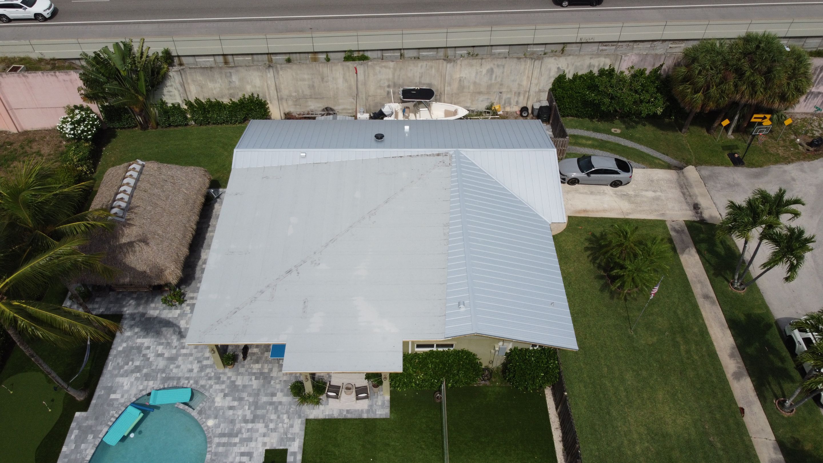 Residential Roofing Installation using 1" Nail strip metal roof by BLUES BROTHERS ROOFING