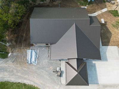 Commercial Roofing Installation using Standing Seam Metal - Burnished Slate Frost