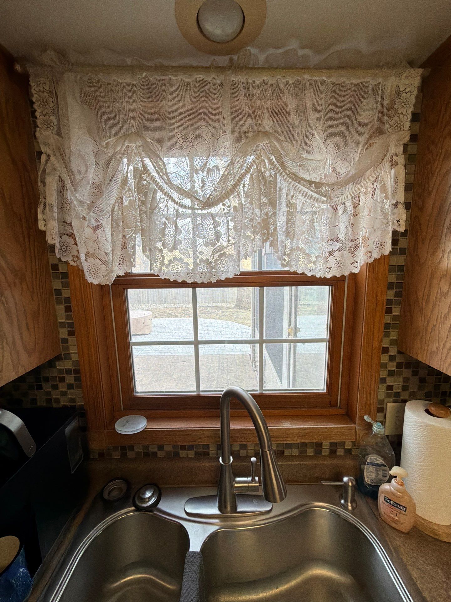 Kitchen Cabinet Painting and Hardware Update in Sioux Falls by Select Painting, Coatings & Garage Cabinets