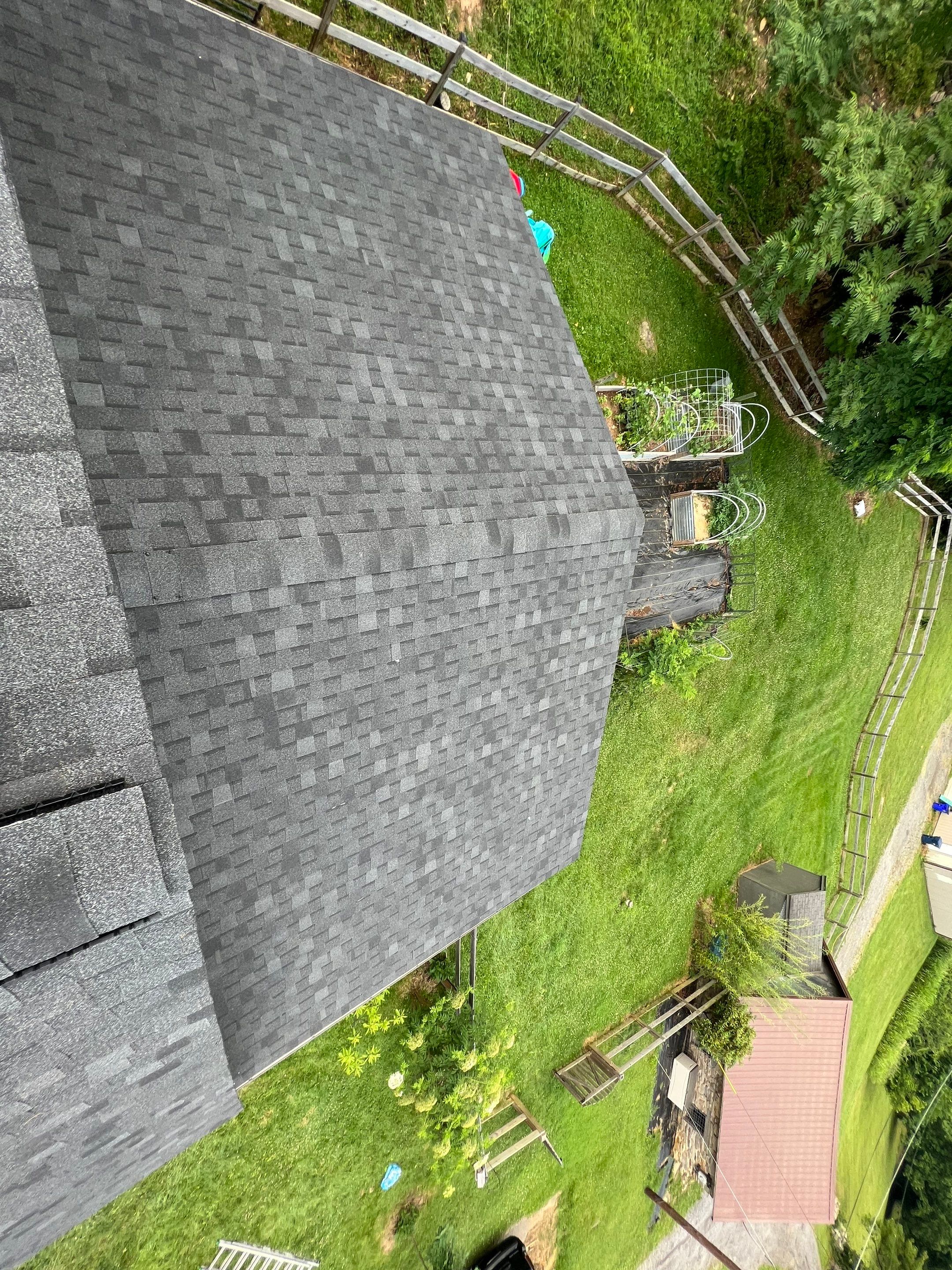 Residential Roofing Installation using Atlas Pinnacle Pristine Black Architectural Shingles by Frederick Roof Repair