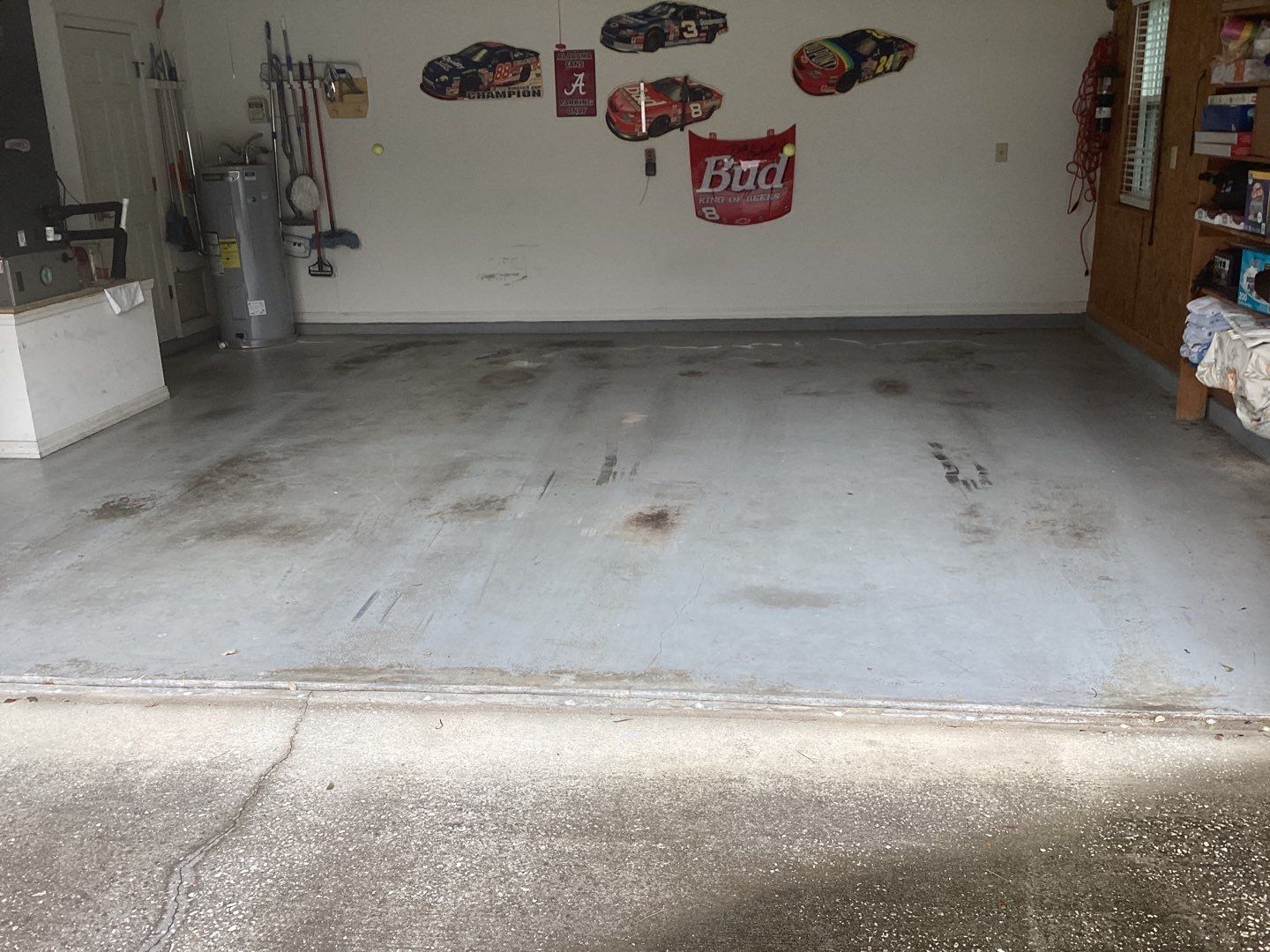 Driveway and Garage using Tidal Wave by Amvet concrete coatings llc