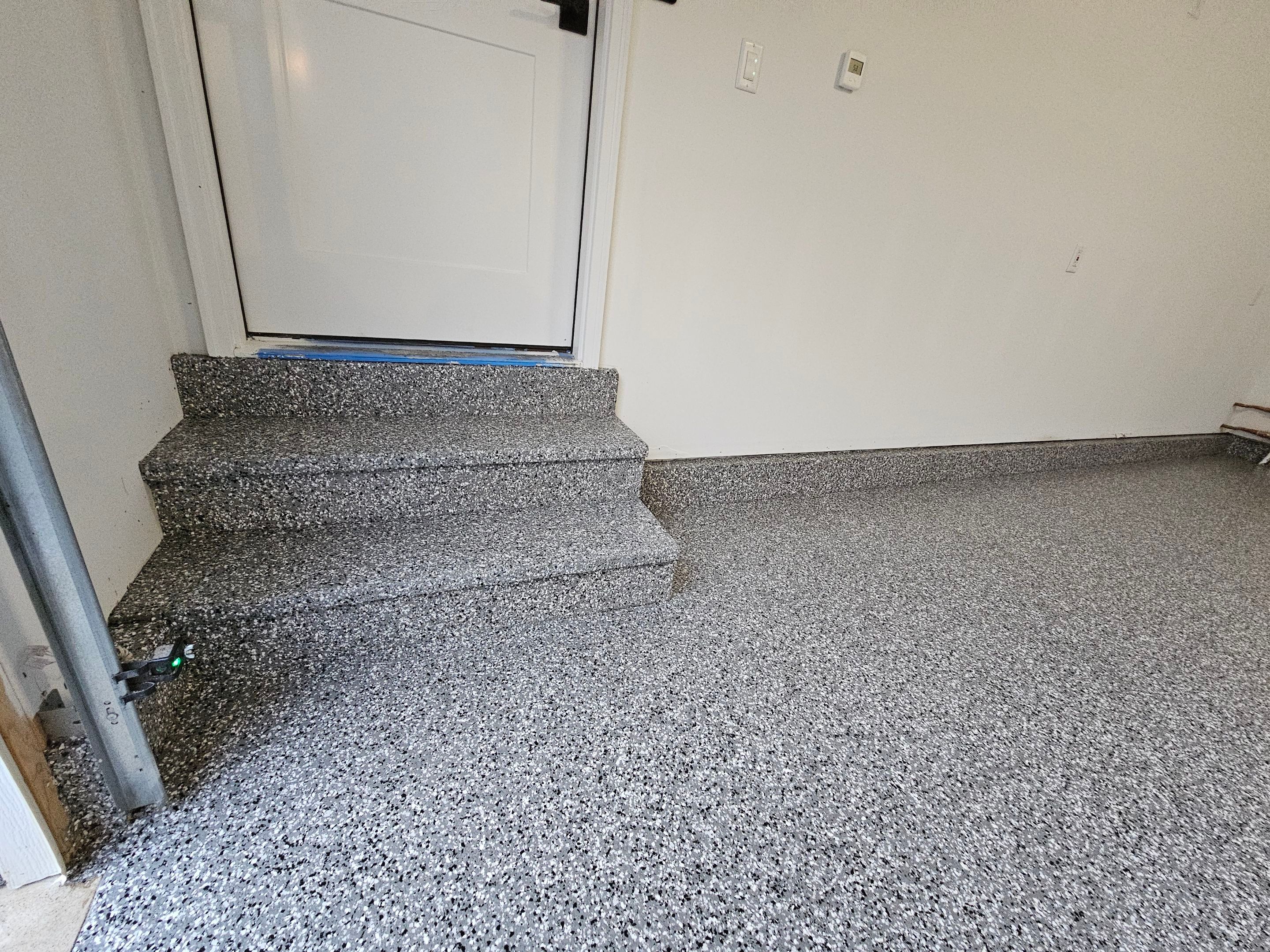 Wombat Flake Garage Floor  by Level 10 Coatings