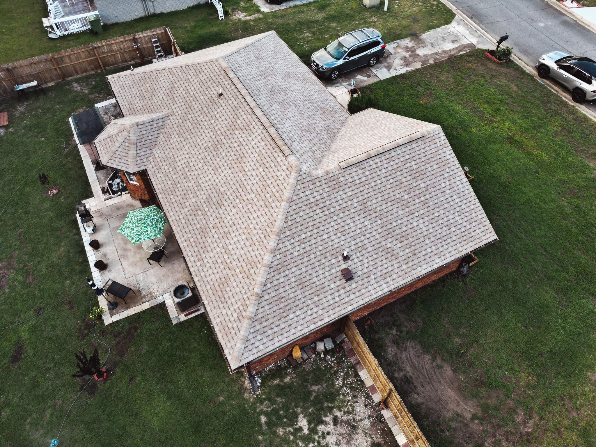 Residential Roofing Installation using Atlas Pinnacle Pristine Tan Mist by Talya Roofing