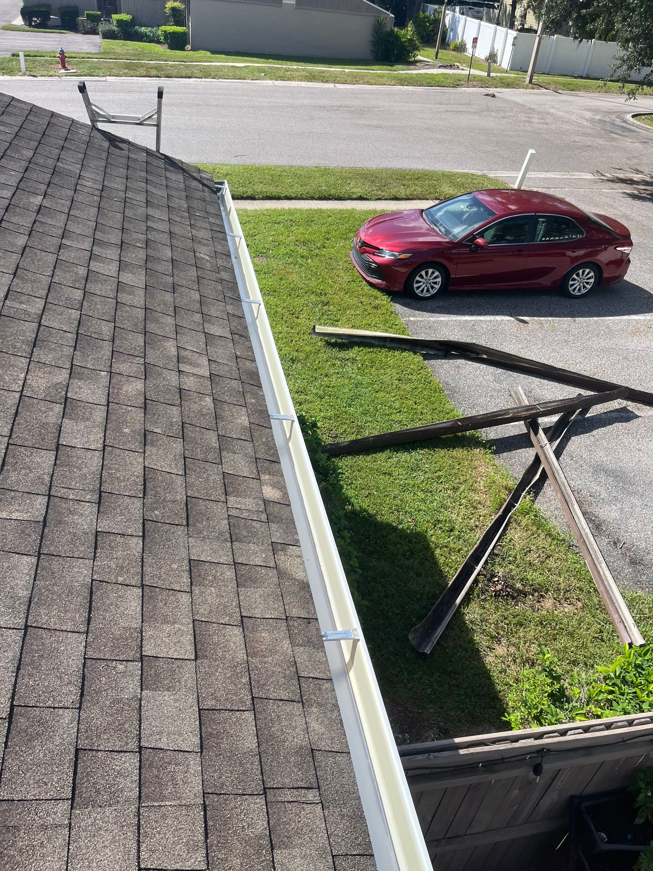 Professional Downspout Installation in Tampa, FL by Gutter Professor by Gutter Professors