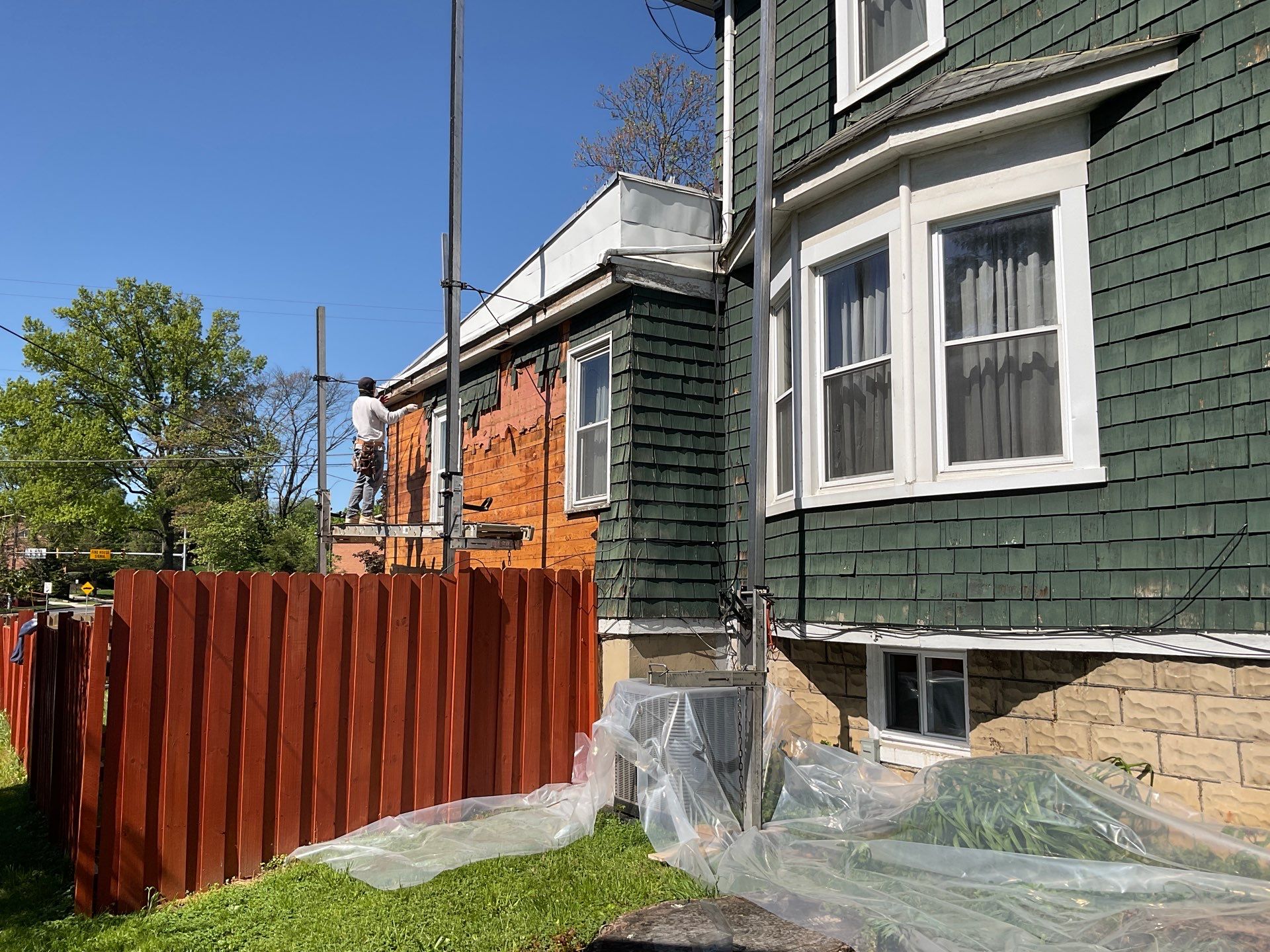 New siding & New Gutters by Alpha Design Services