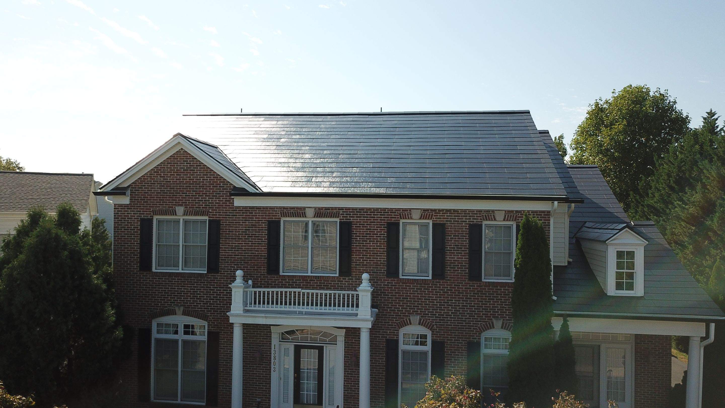 Tesla Solar Roof Replacement using Tesla Solar Roof V3 tiles by American Home Contractors