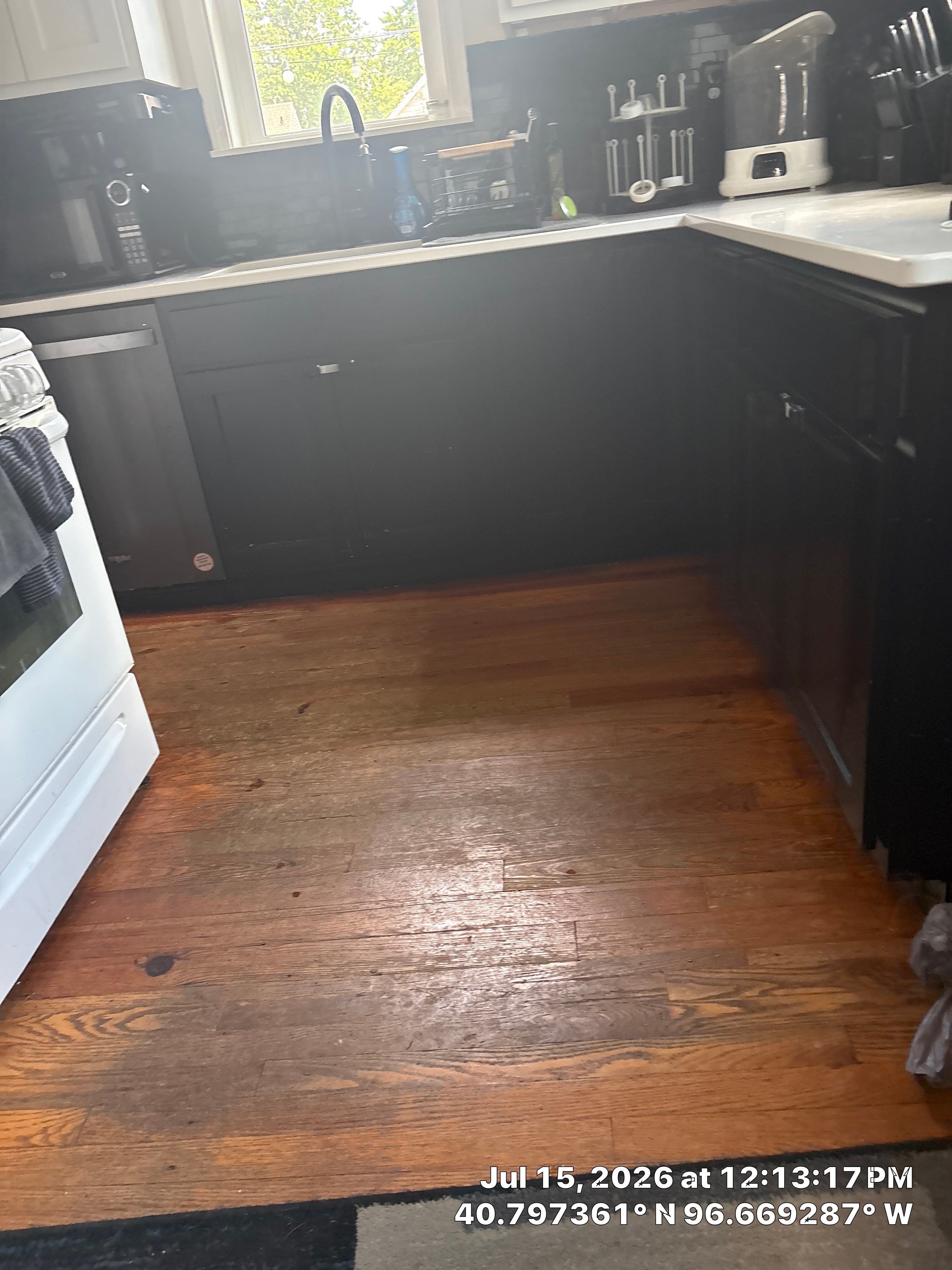 Modern Lincoln Kitchen Renovation Featuring Matte Black and White Cabinetry by CompanyCam Sales Demo