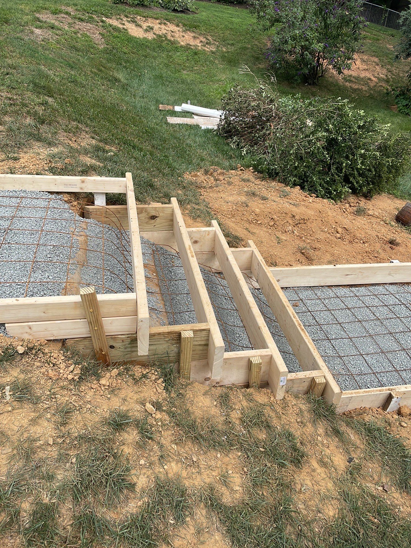 New walkway with stairs and a new front porch by Fairfax Contractors, LLC