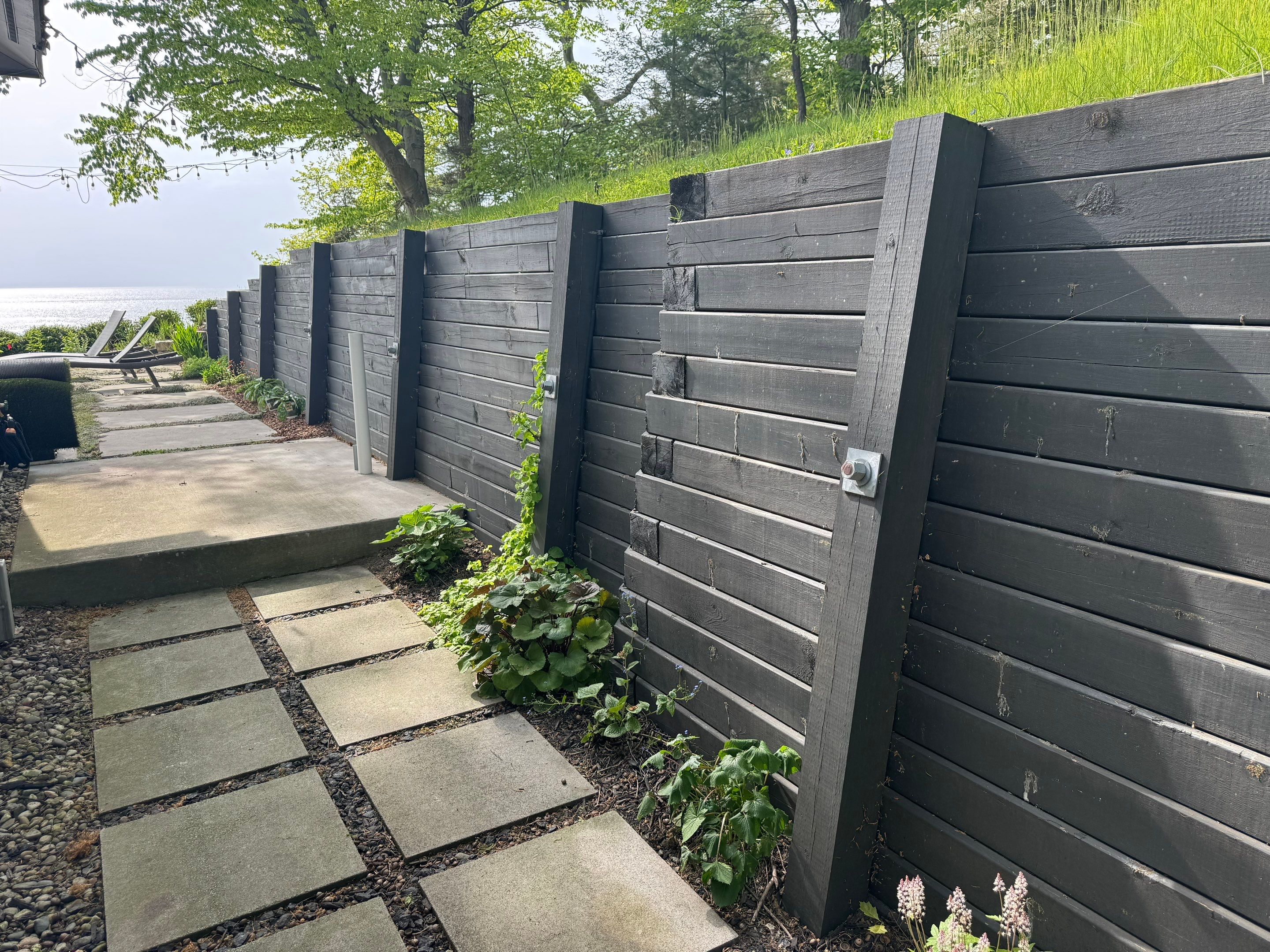 Exterior Retaining Wall Painting | Grand Haven, Michigan by Gordon Painting