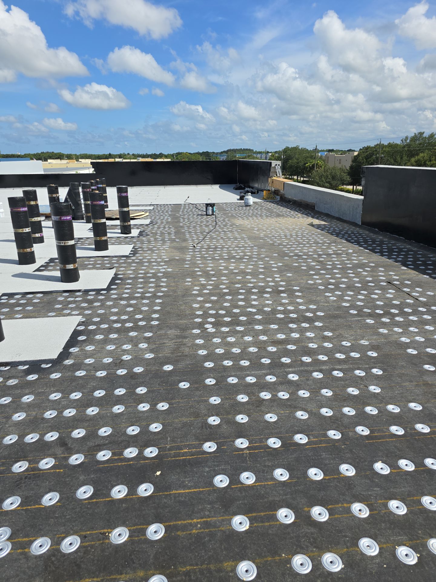 Torch Applied Modified Bitumen Roof Installation by Sailfish Roofing