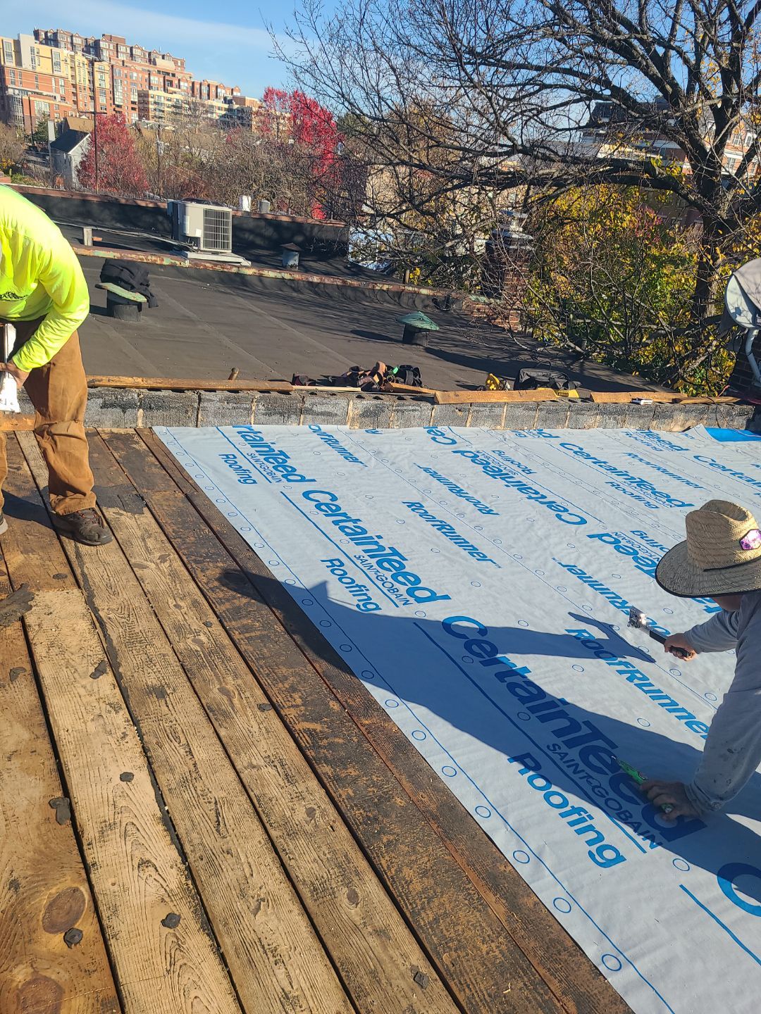 Alexandria: Residential Flat Roof Replacement with Mule Hide TPO Membrane by RM Banning, Inc.