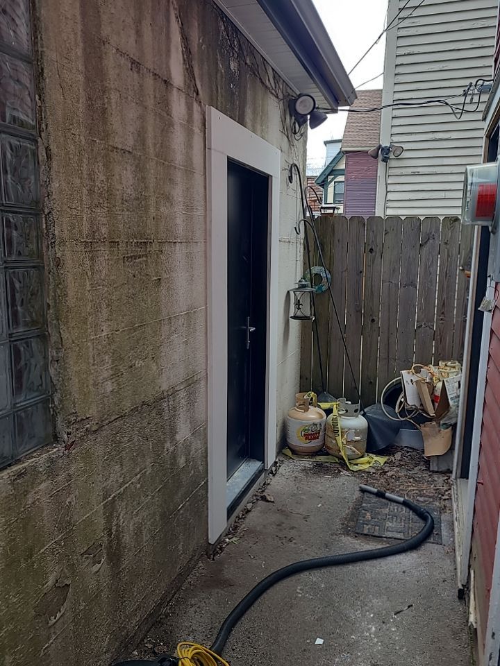Exterior Renovations- Siding, Stamped Concrete, Porch, and Railings by Ivy Lea Construction