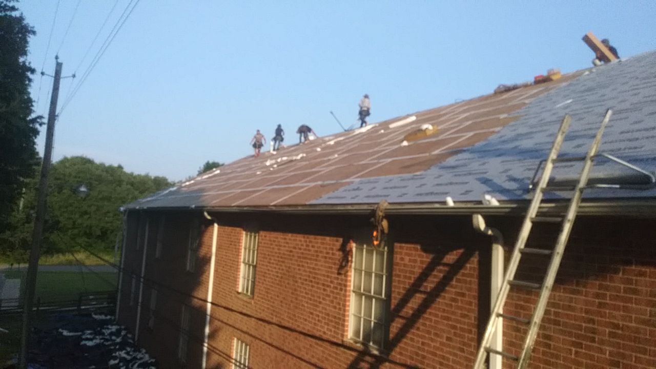 Residential Roofing Installation using Roof Replacement by American Roofing & Construction LLC