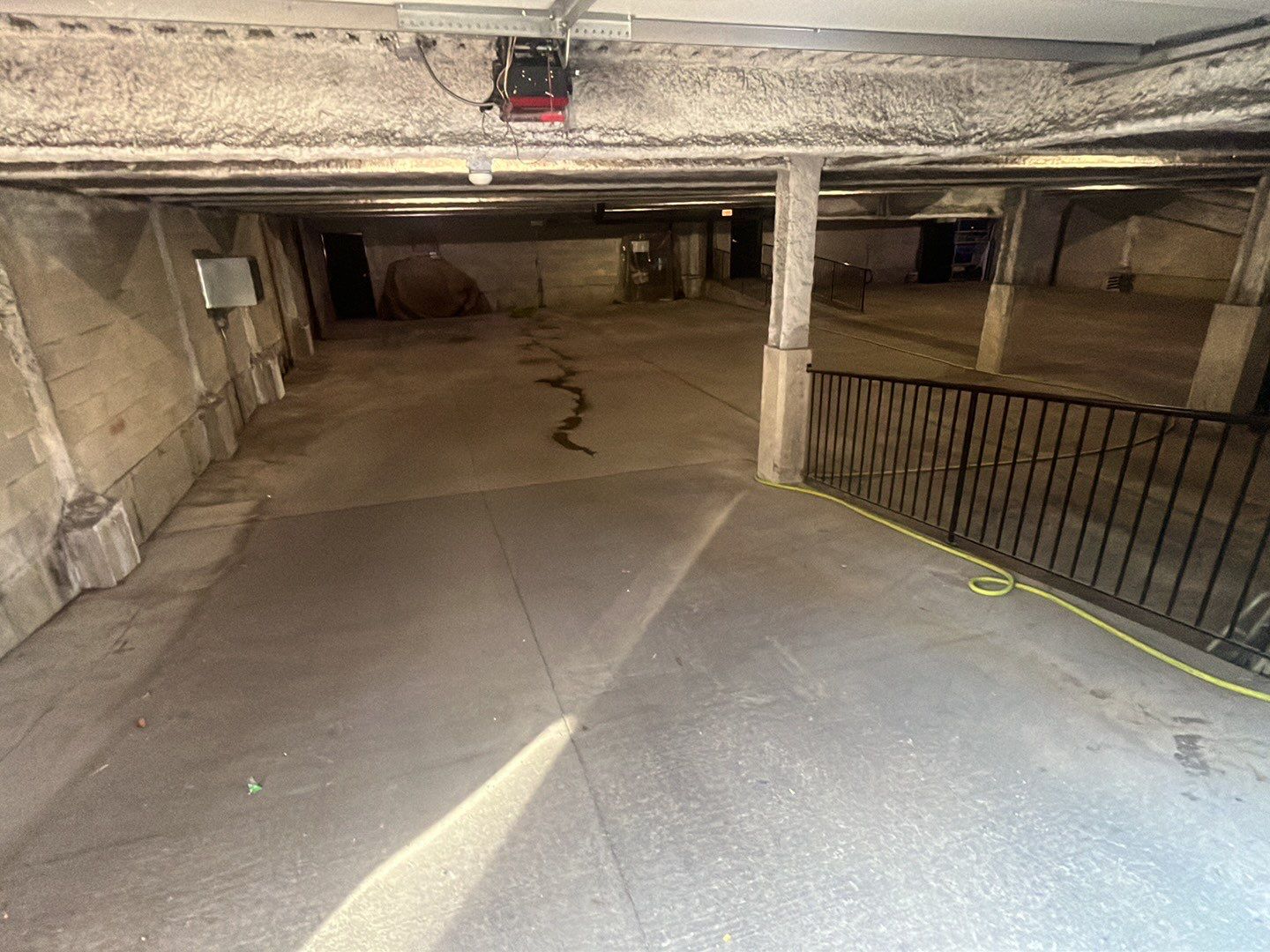Parking garage using Hot water by Northern Power Washing LLC.