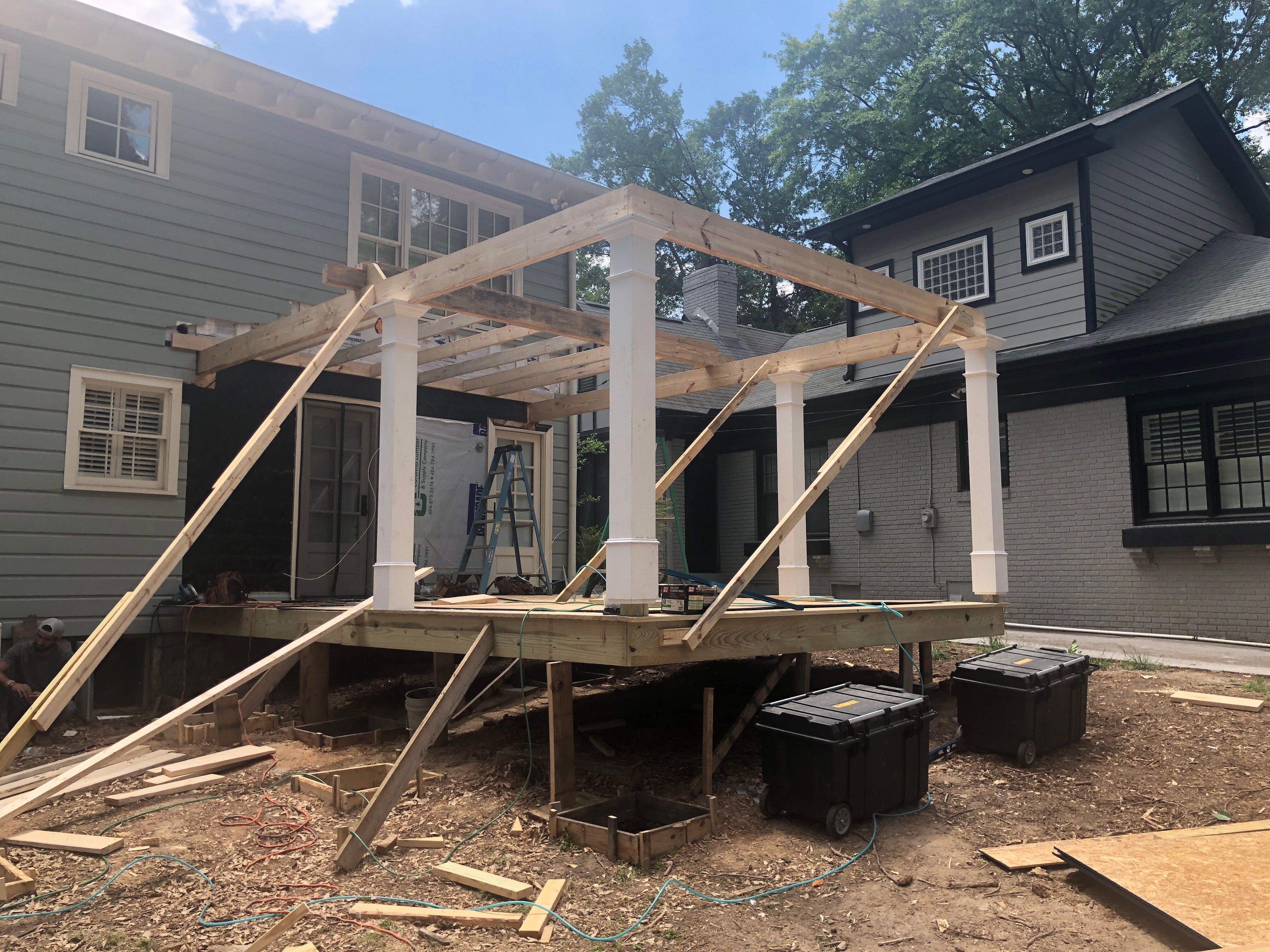 Atlanta Screen Porch Addition Featuring White Brick Outdoor Fireplace by Swift Home Renovations