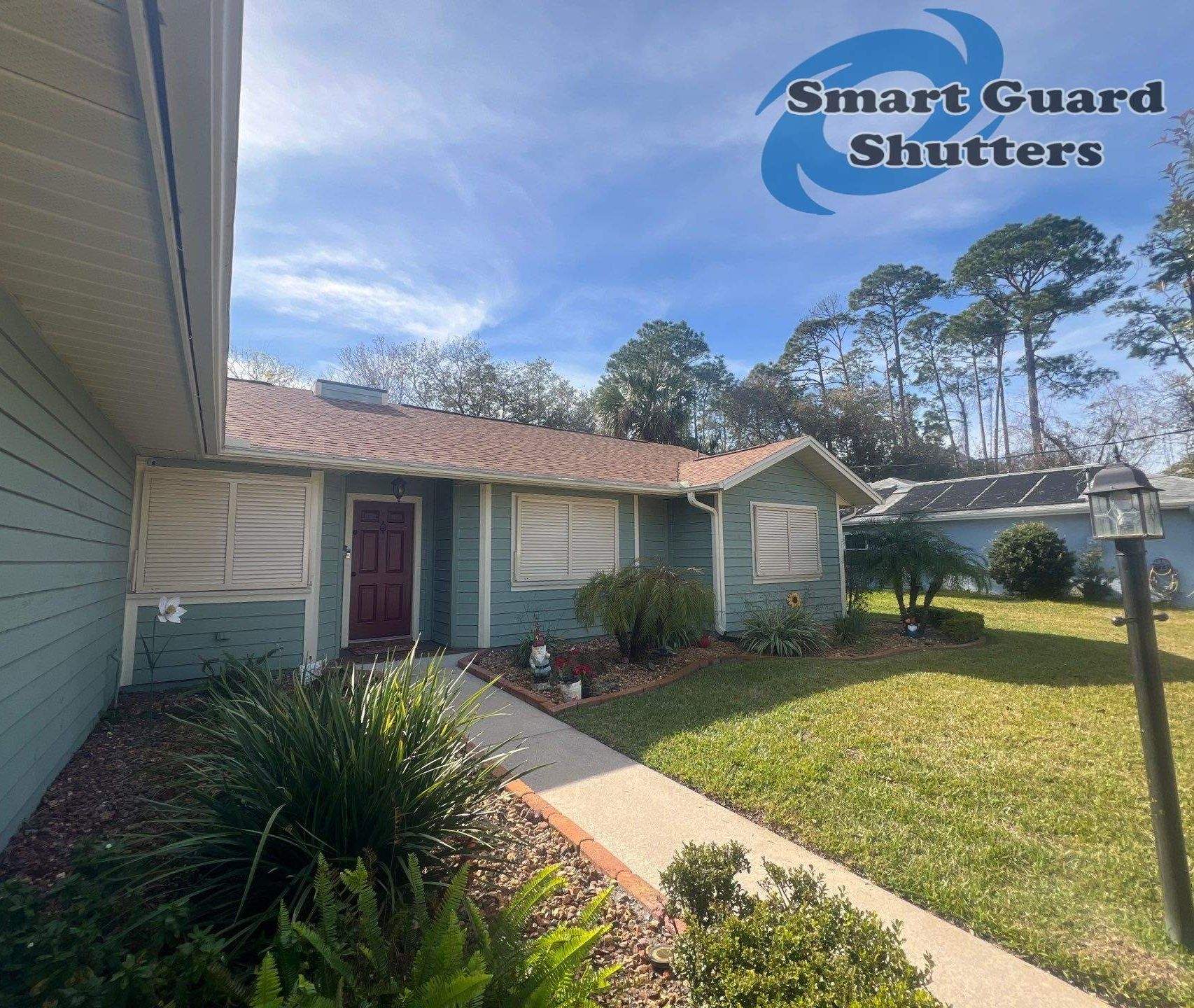 Impact Bahama Shutters in Light Ivory by Smart Guard Shutters