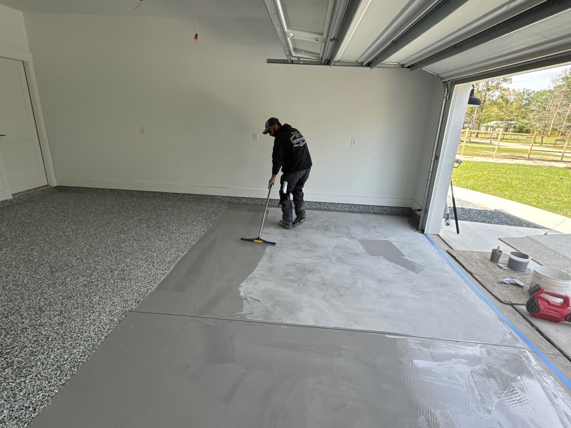 Garage in Domino by Cross Creek Concrete Coatings