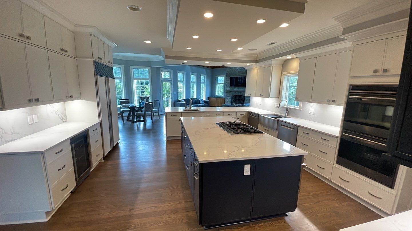 Kitchen Remodel using Fabuwood Luna Dove and Indigo Cabinetry by HomeWerkes Design & Build